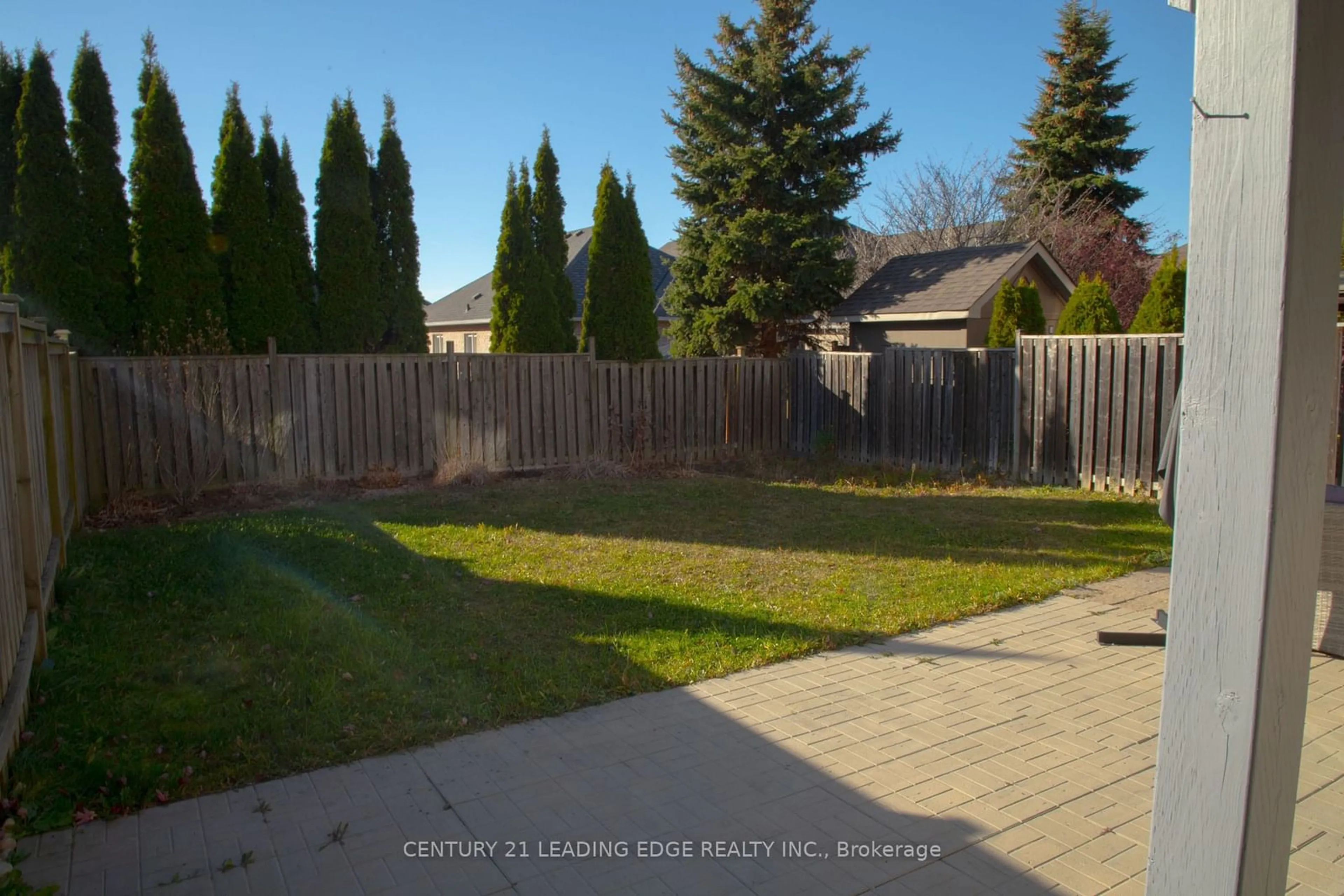 Frontside or backside of a home, the fenced backyard for 157 Dooley Cres, Ajax Ontario L1T 4J6