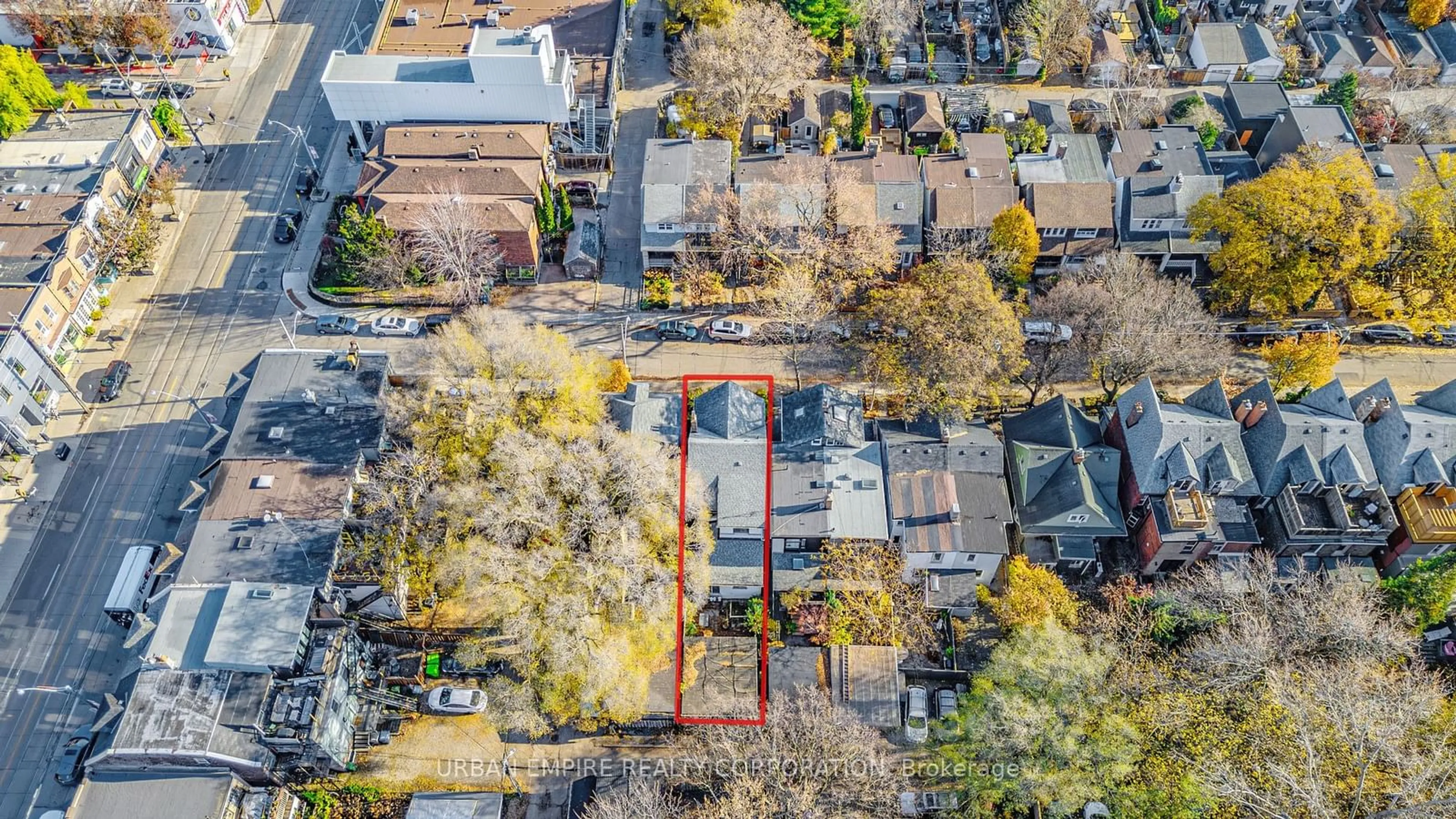 A pic from exterior of the house or condo, the fenced backyard for 108 Caroline Ave, Toronto Ontario M4M 2X7