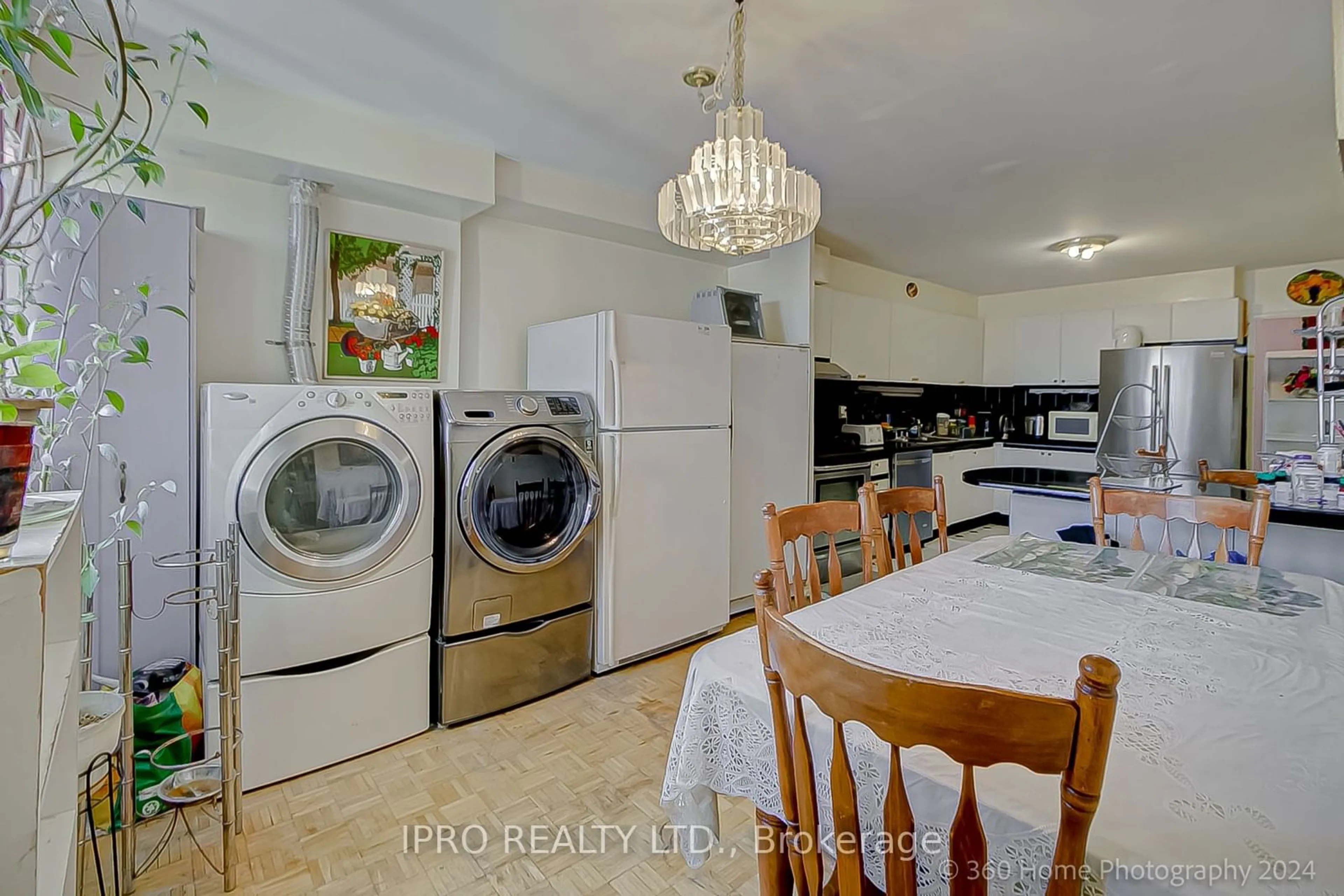 Kitchen with laundary machines, ceramic/tile floor for 3 Massey Sq #2901, Toronto Ontario M4C 5L5