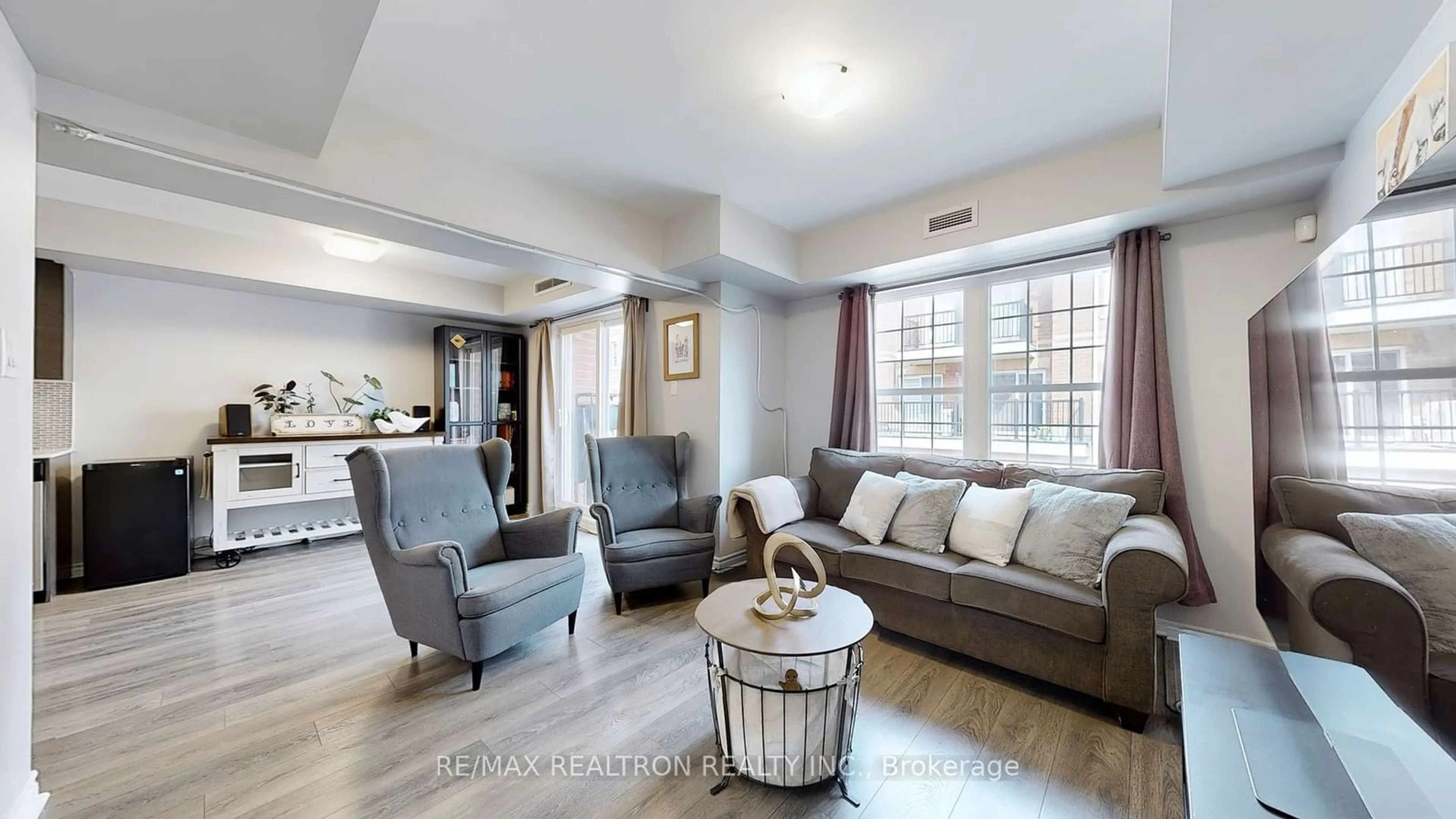 Living room, wood floors for 1483 Birchmount Rd #304, Toronto Ontario M1P 2G4