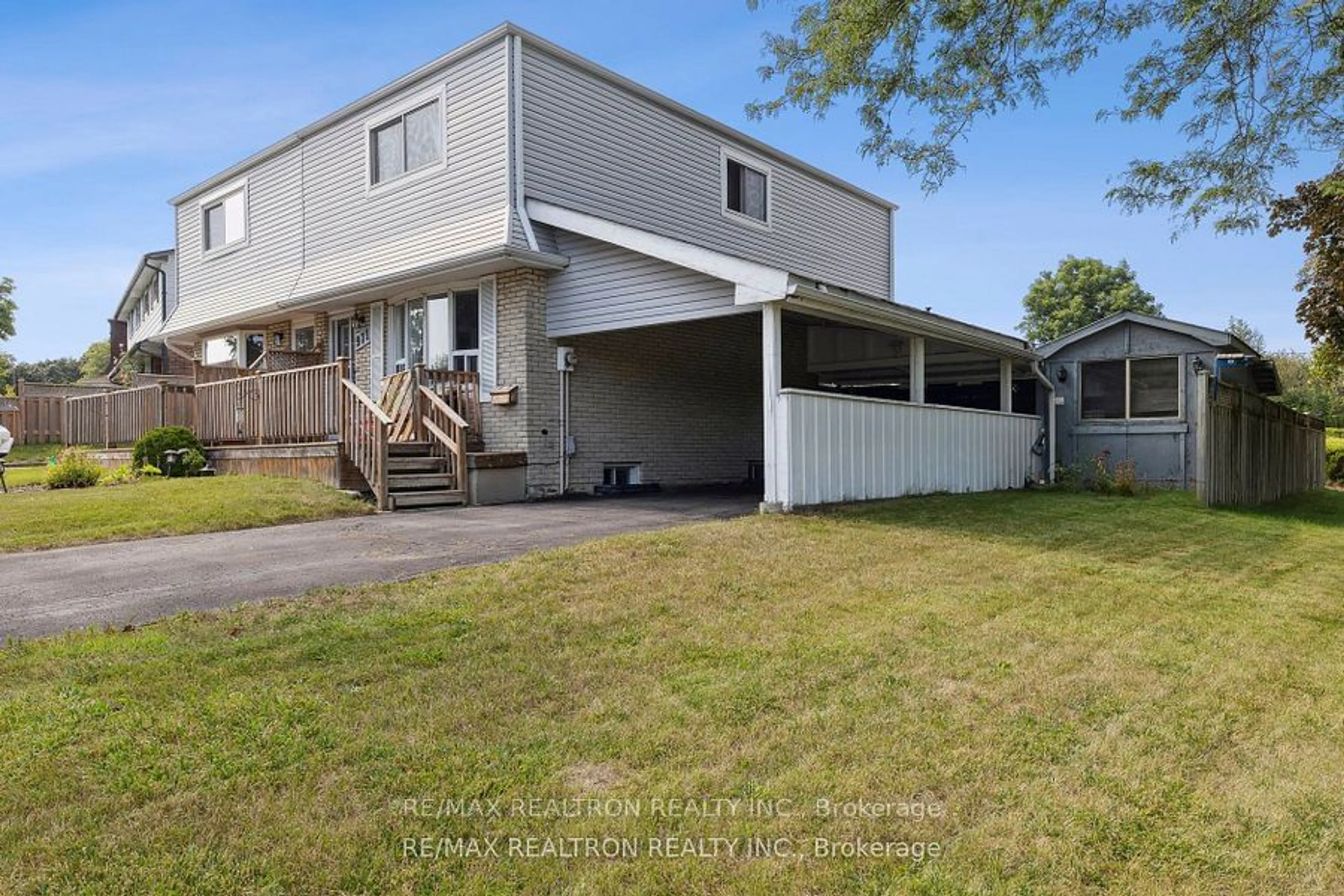 Frontside or backside of a home, the fenced backyard for 971 Florell Dr, Oshawa Ontario L1H 6W4