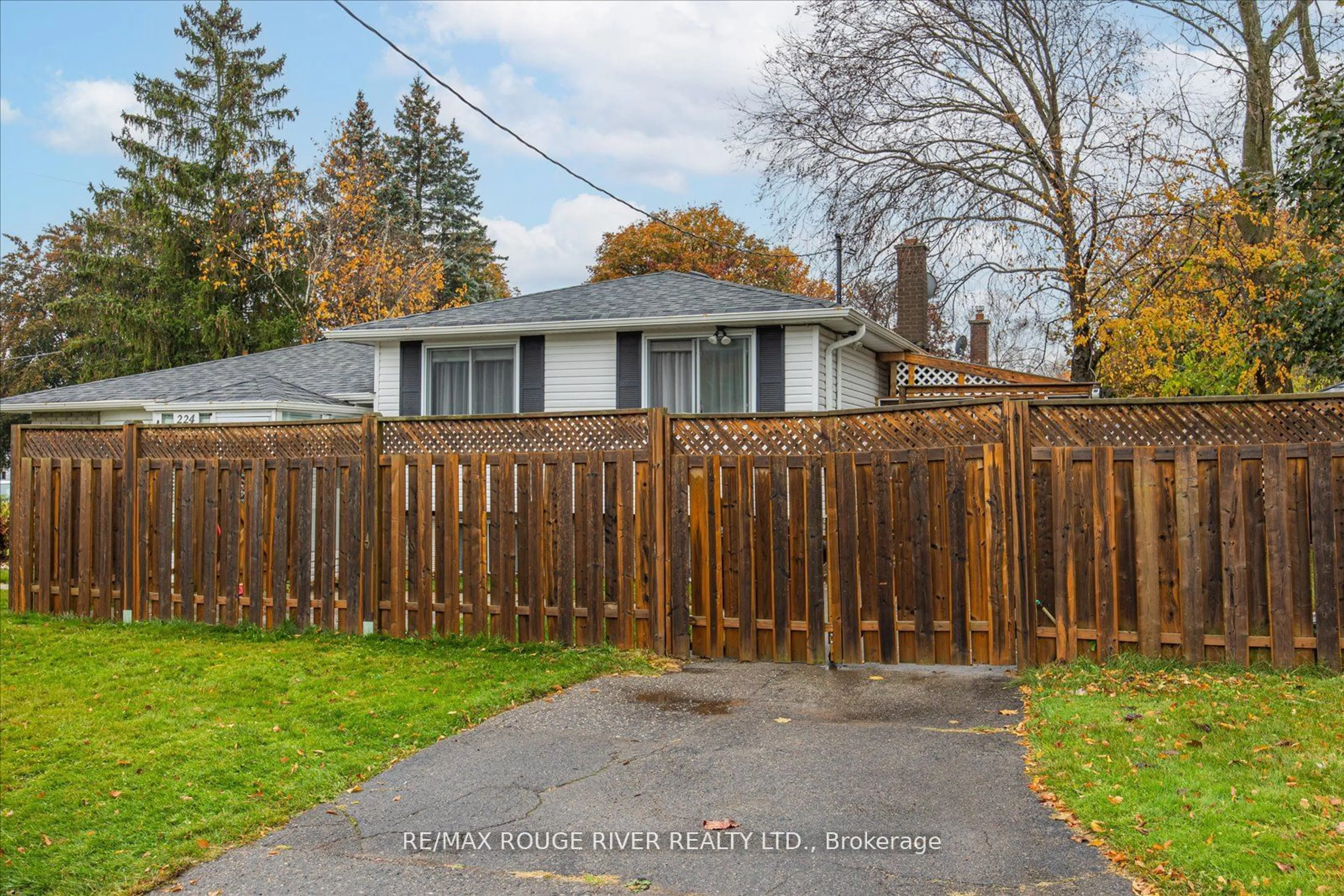 Frontside or backside of a home, the fenced backyard for 224 Arden Dr, Oshawa Ontario L1G 1X5