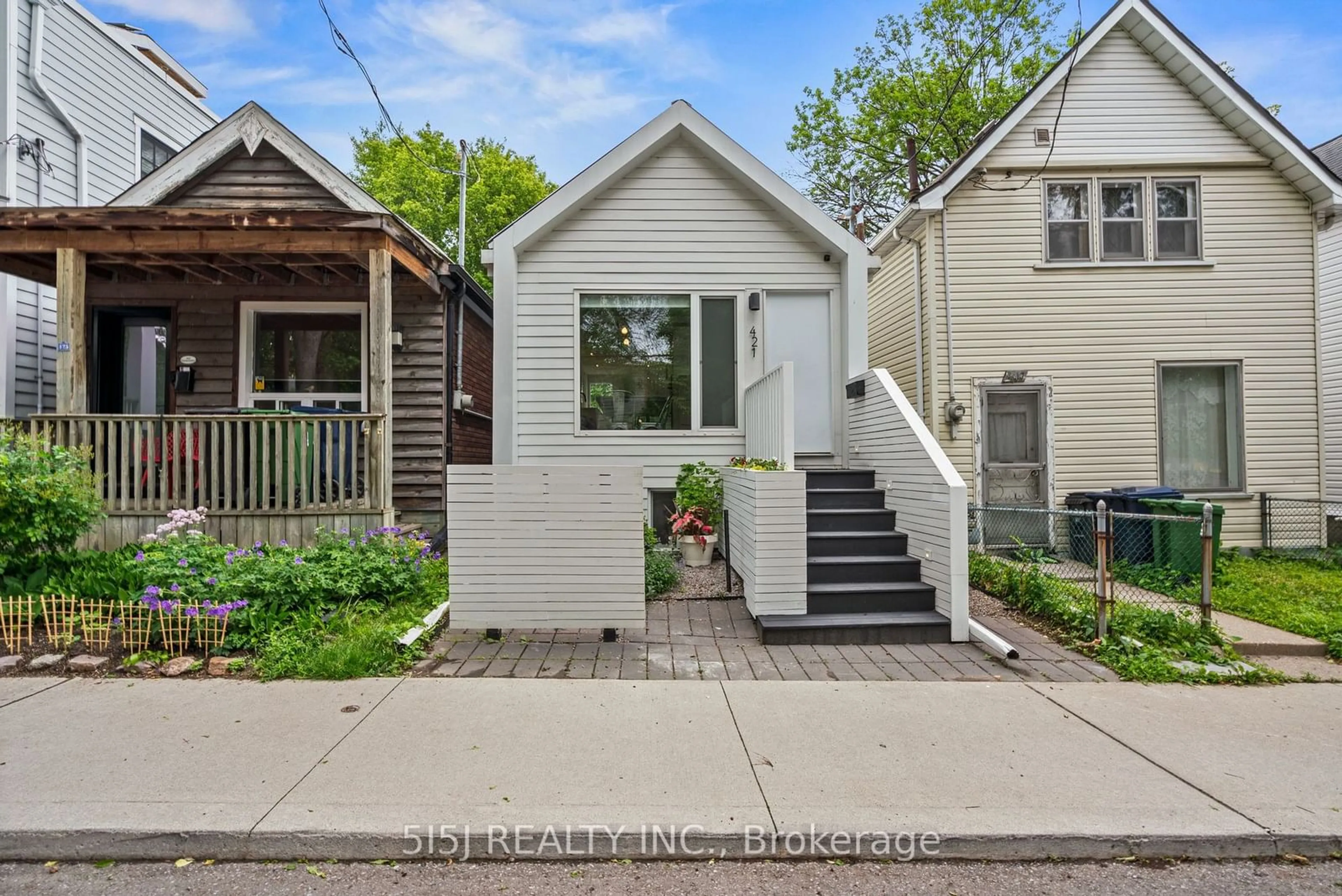 Frontside or backside of a home, cottage for 421 Craven Rd, Toronto Ontario M4L 2Z5