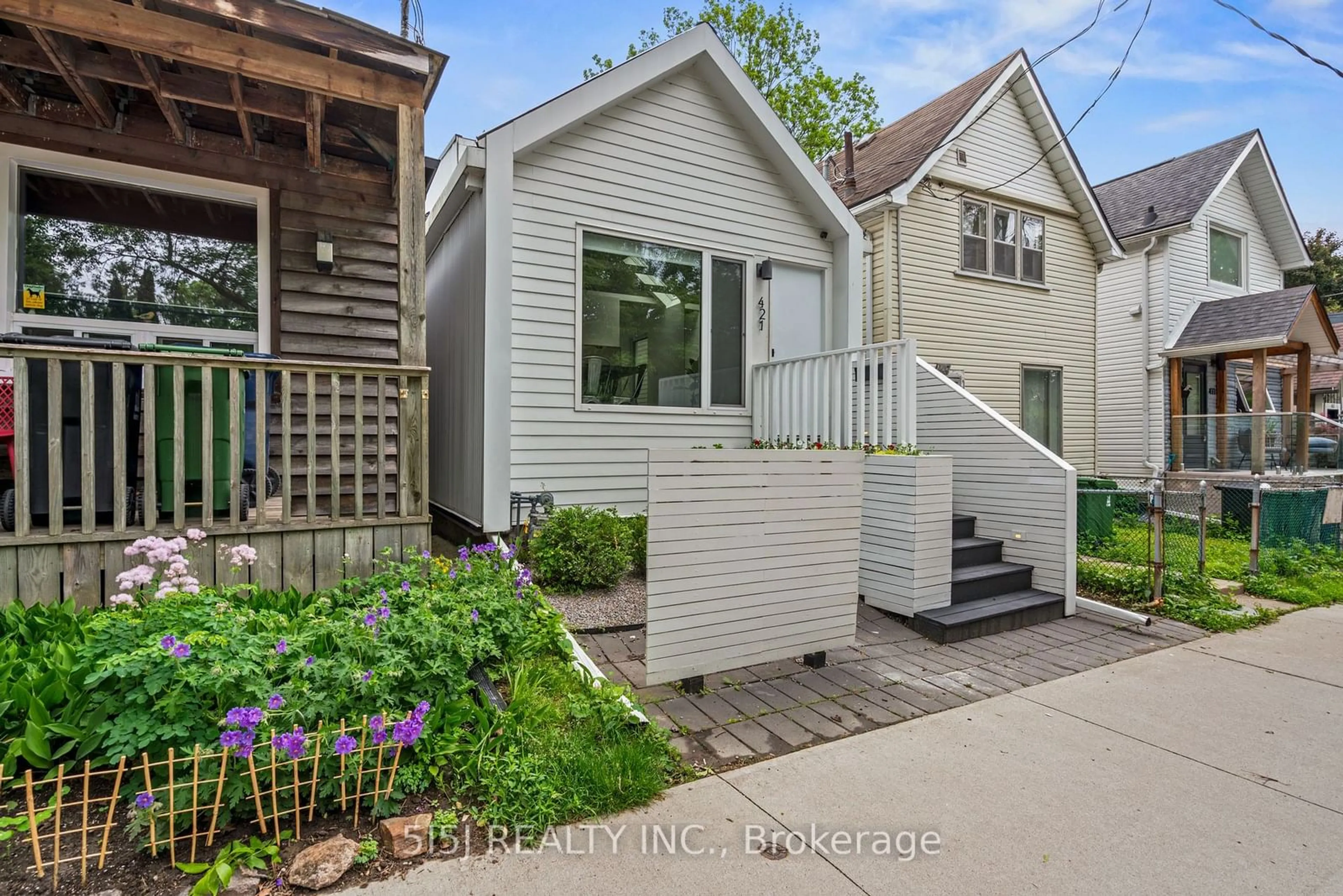 Frontside or backside of a home, cottage for 421 Craven Rd, Toronto Ontario M4L 2Z5