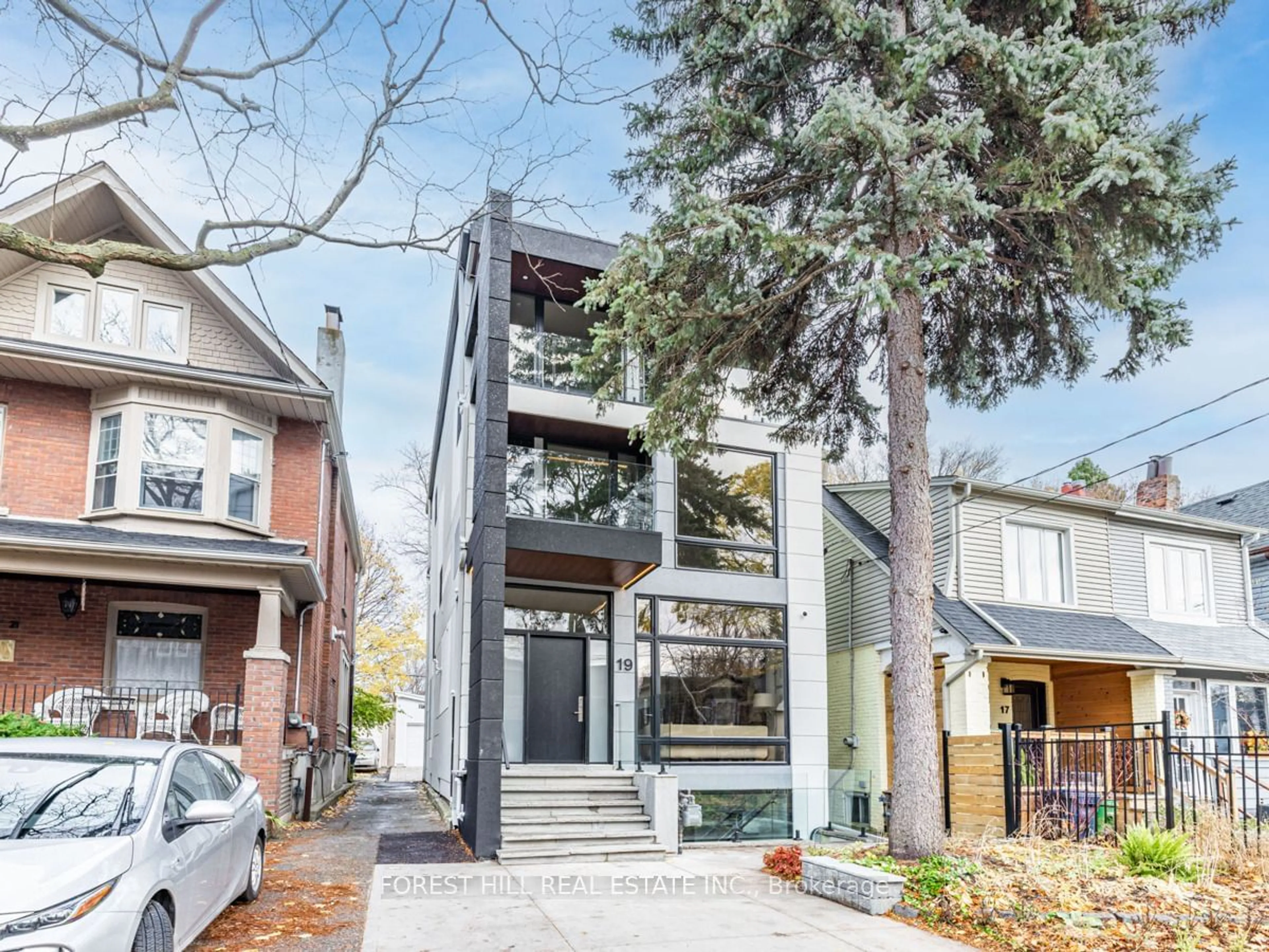 Frontside or backside of a home, the street view for 19 Devon Rd, Toronto Ontario M4E 2J7