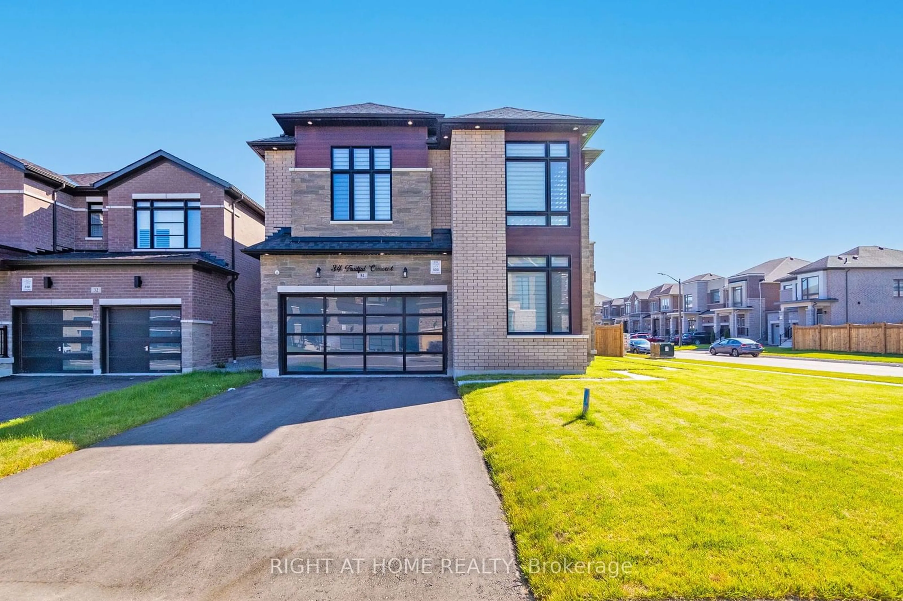 Frontside or backside of a home, the street view for 34 Fruitful Cres, Whitby Ontario L1P 0N3