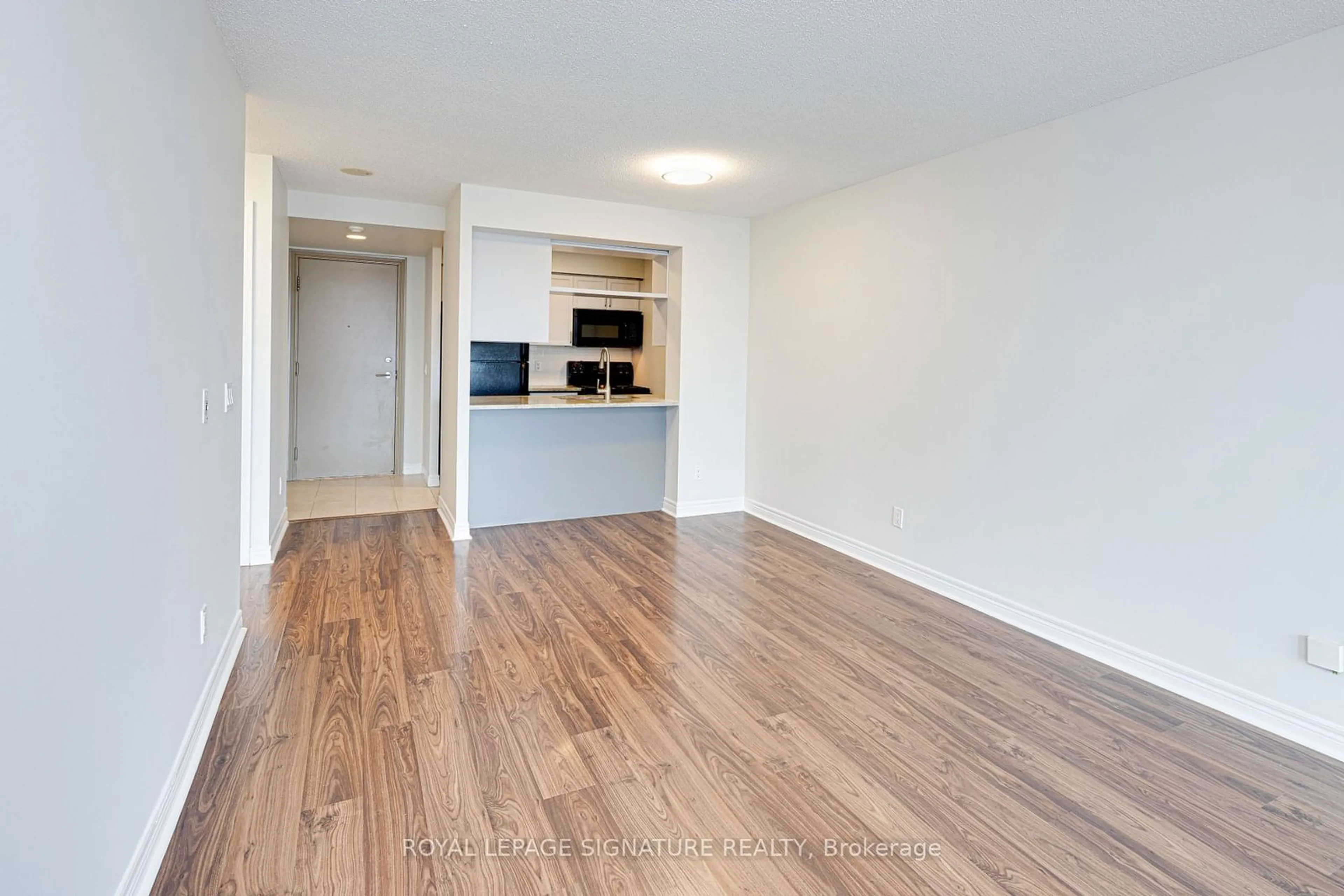 A pic of a room, wood floors for 70 Town Centre Crt #1803, Toronto Ontario M1P 0B2