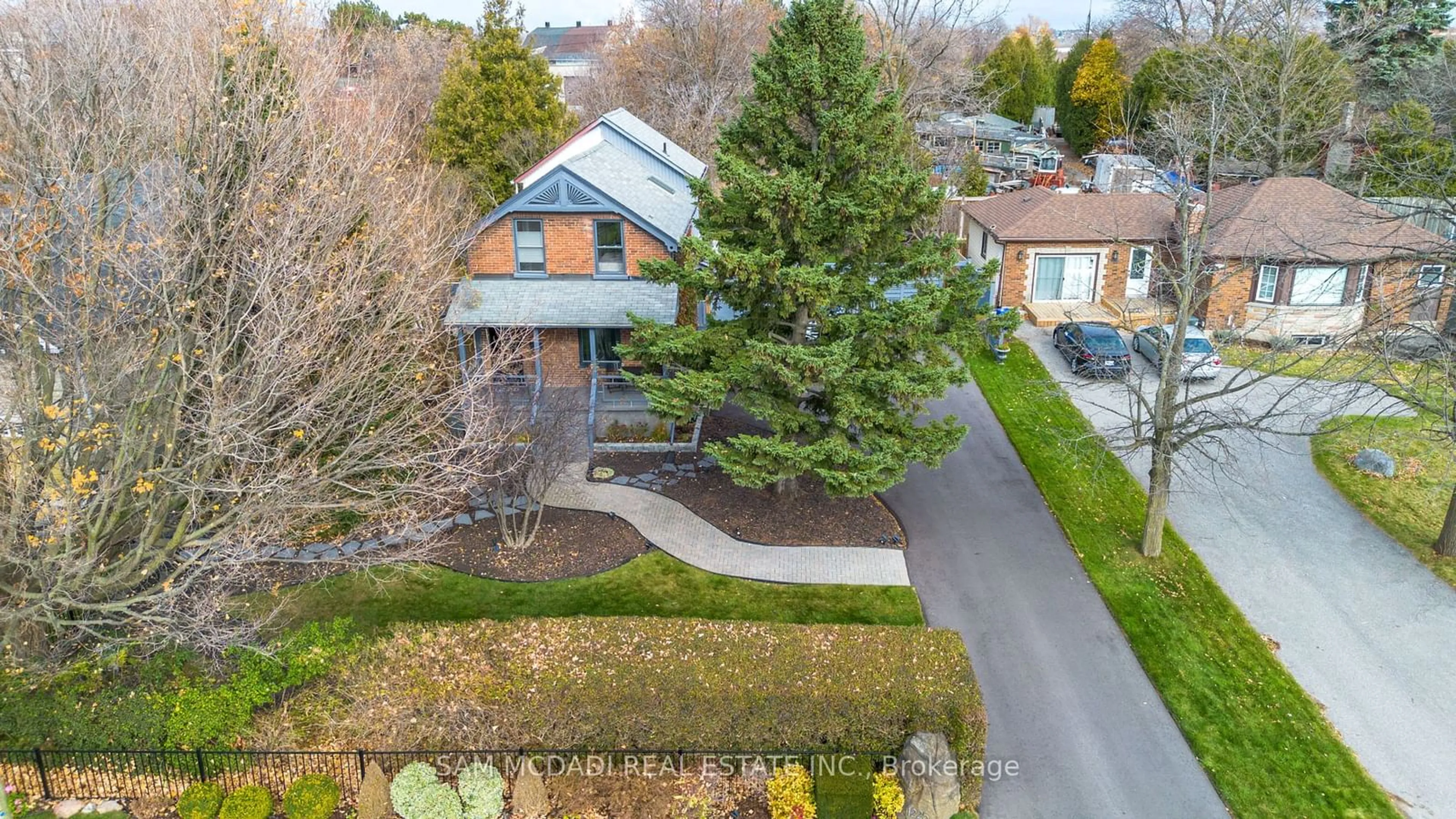 Frontside or backside of a home, the fenced backyard for 1225 Simcoe St, Oshawa Ontario L1H 4M1