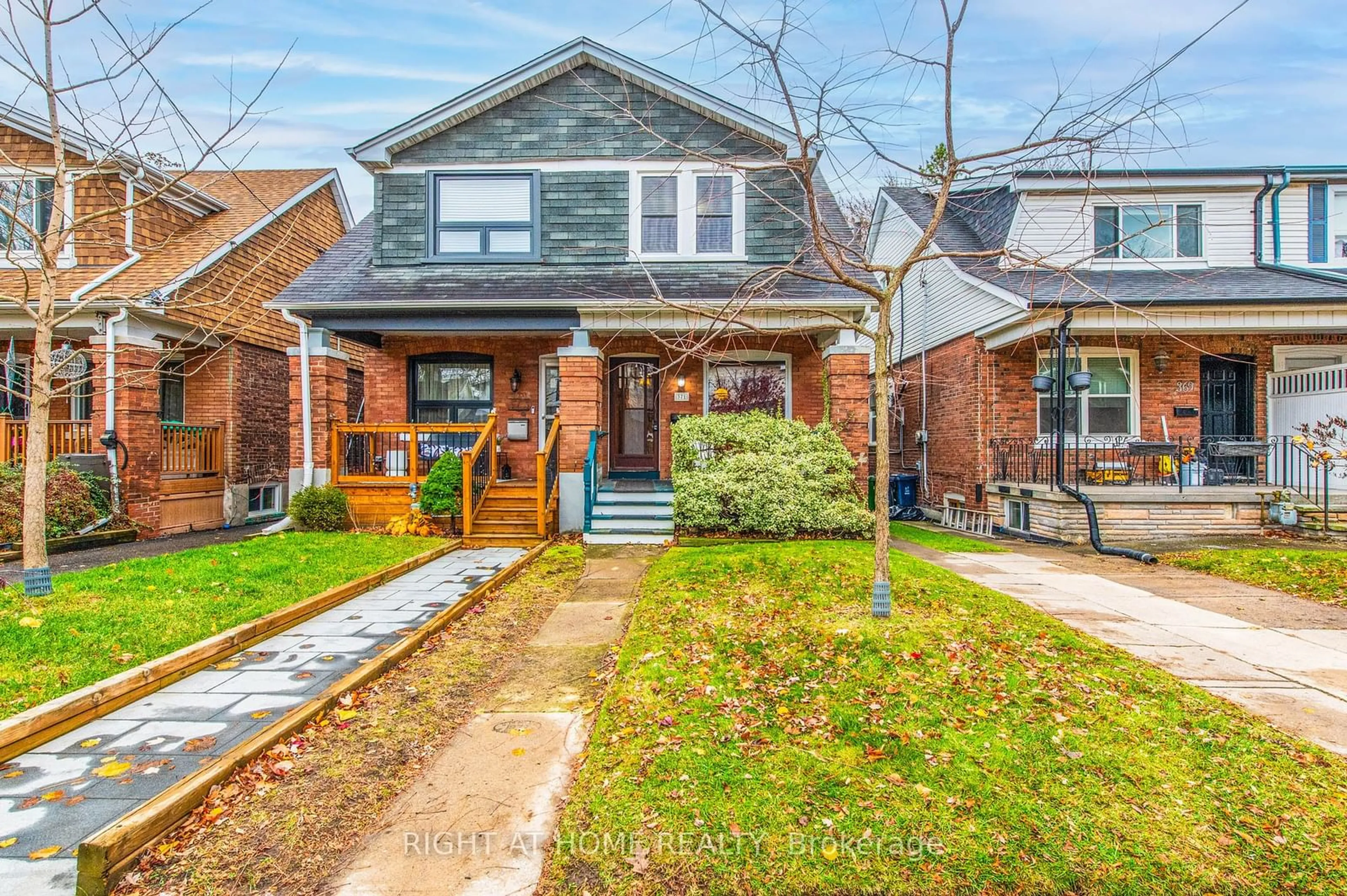 Frontside or backside of a home, the street view for 371 Milverton Blvd, Toronto Ontario M4J 1W1