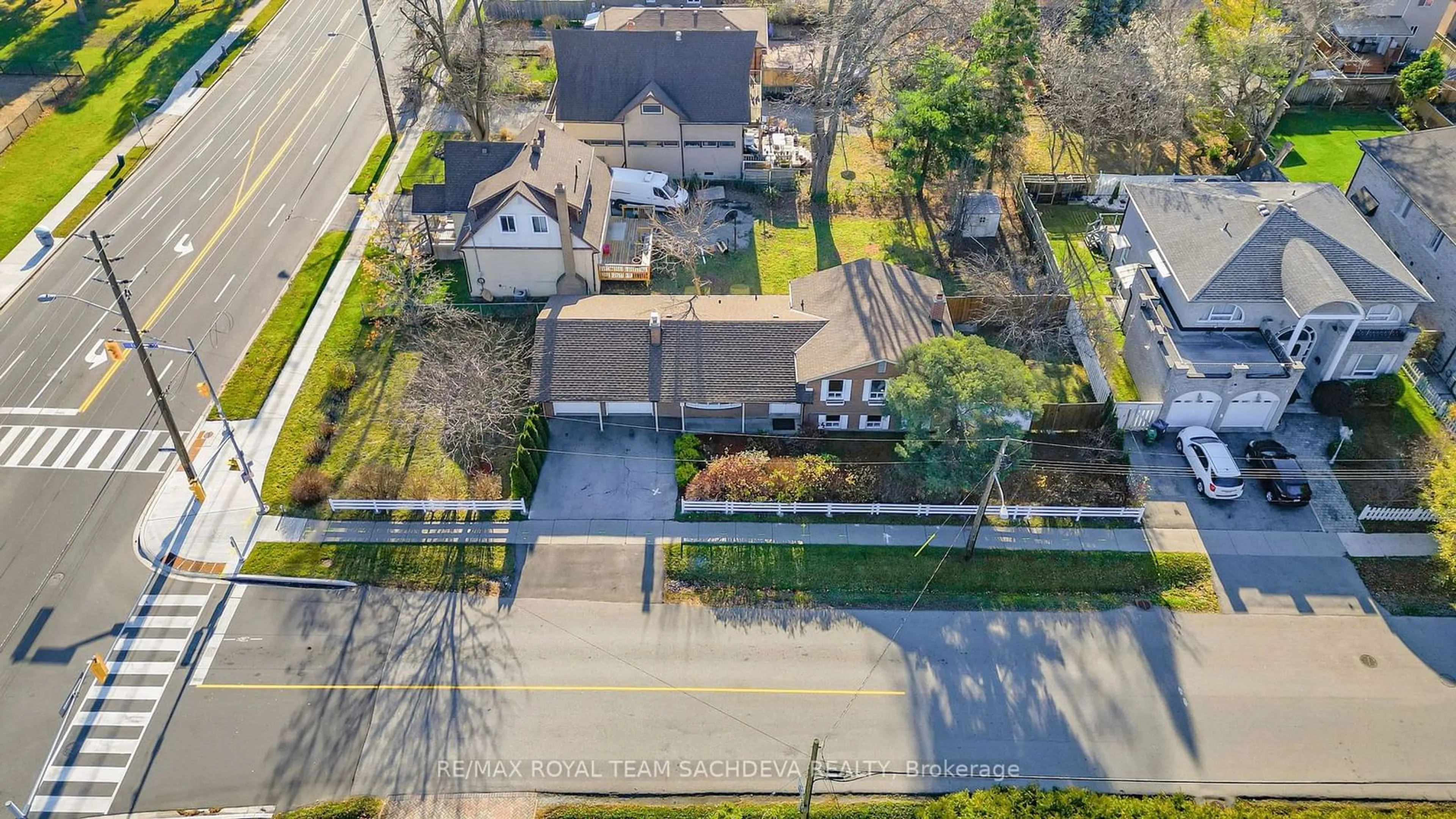 A pic from exterior of the house or condo, the fenced backyard for 157 Euclid Ave, Toronto Ontario M1C 1K2