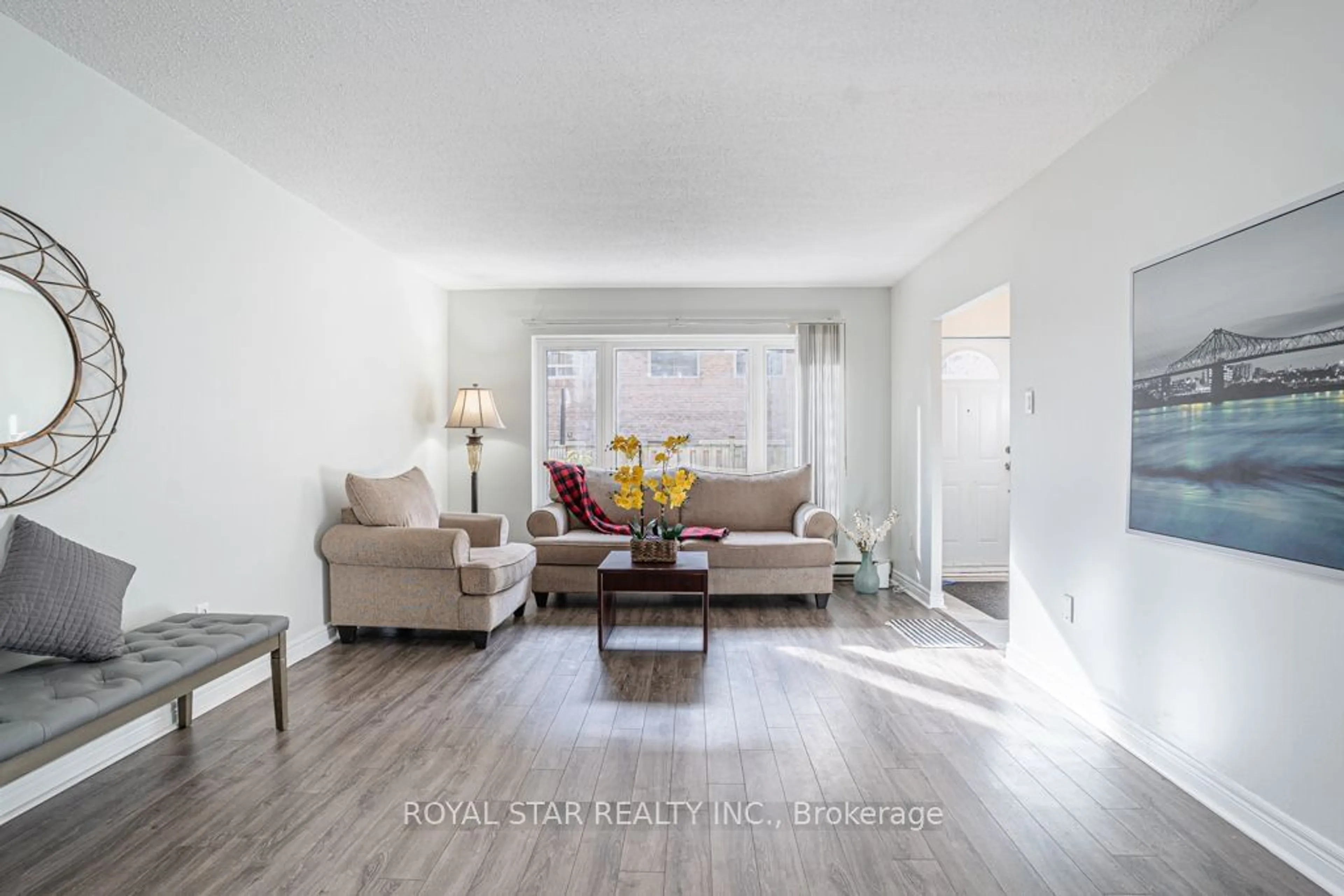 Living room, wood floors for 91 Muir Dr #23, Toronto Ontario M1M 3T7