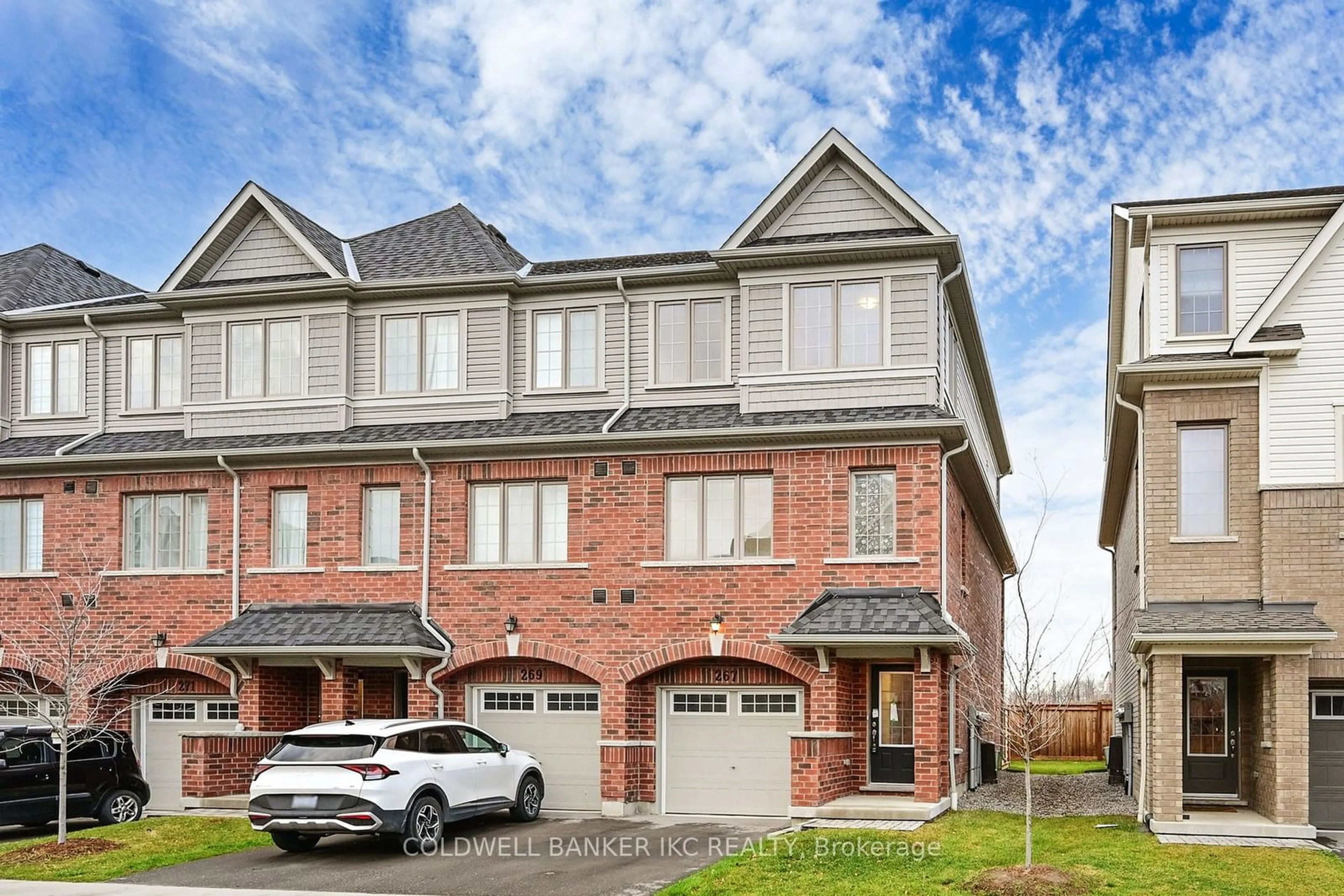 A pic from exterior of the house or condo, the street view for 267 Danzatore Path, Oshawa Ontario L1L 0P9