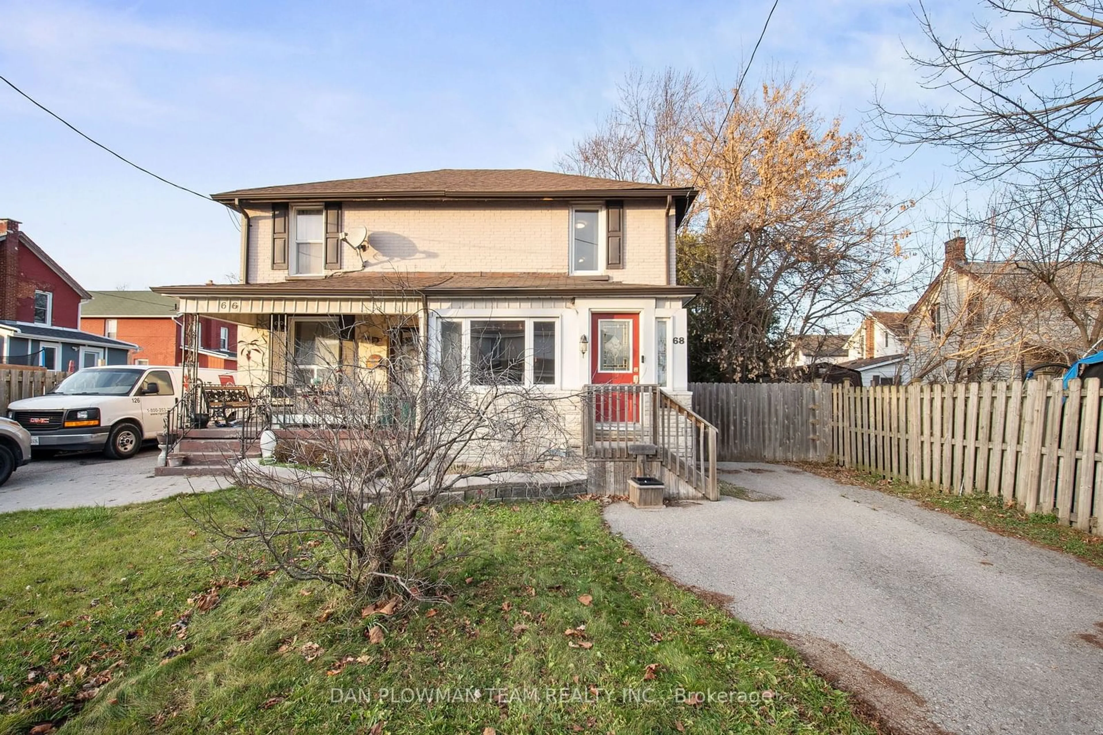 Frontside or backside of a home, the fenced backyard for 68 Third Ave, Oshawa Ontario L1H 3A5