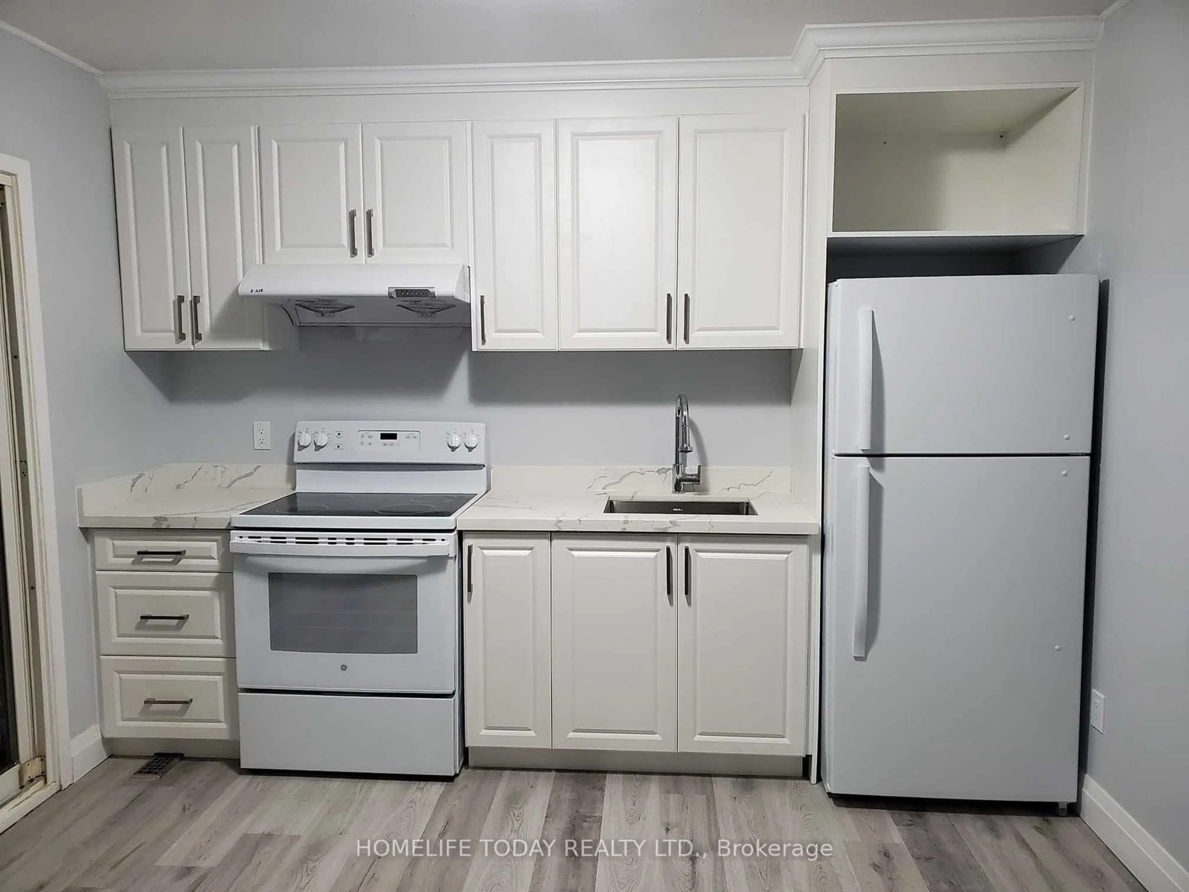 Standard kitchen, wood floors, cottage for 6421 Kingston Rd, Toronto Ontario M1C 1L2