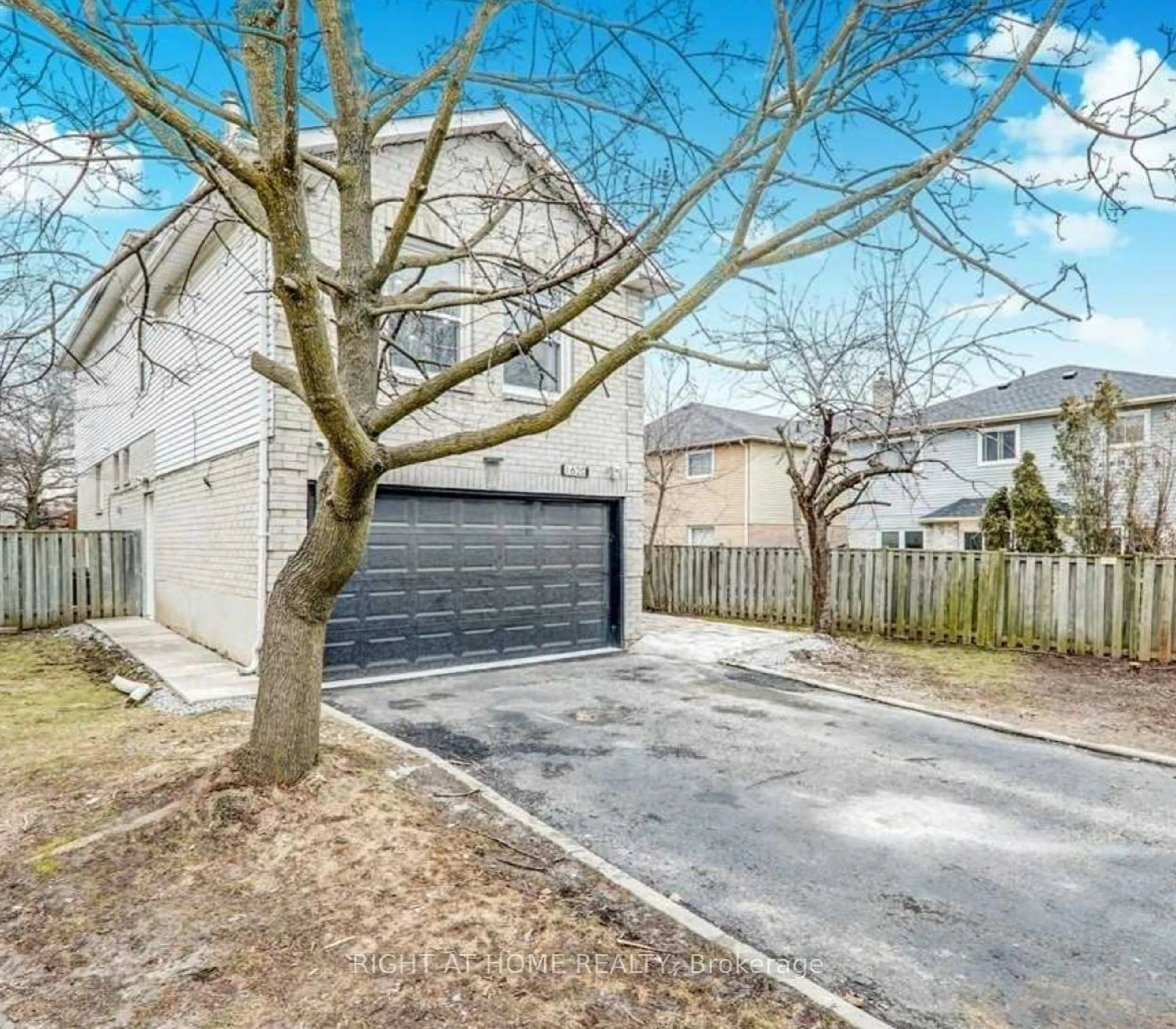 A pic from exterior of the house or condo, the fenced backyard for 1620 Mcbrady Cres, Pickering Ontario L1X 2B6