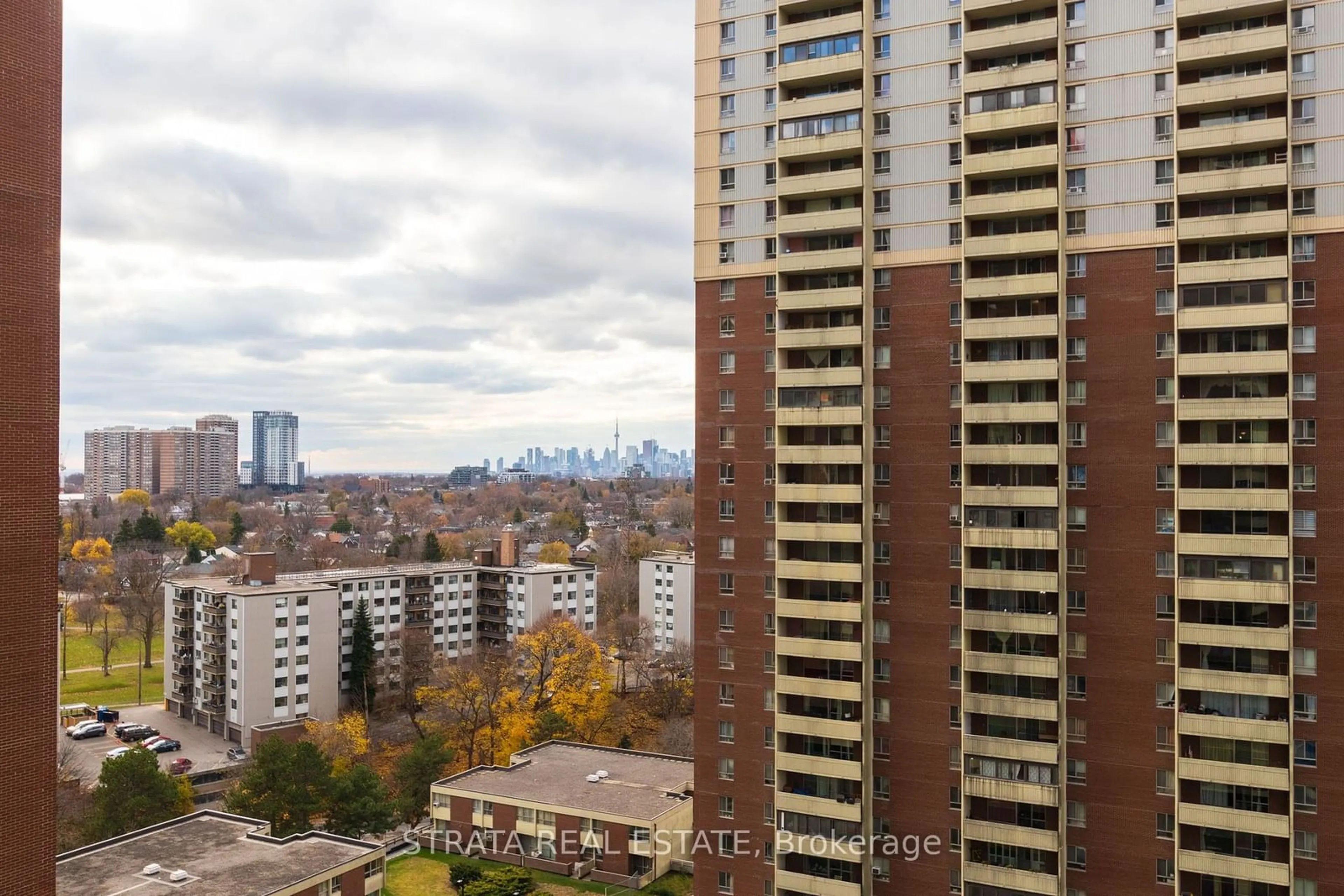 A pic from exterior of the house or condo, the view of city buildings for 5 Massey Sq #1604, Toronto Ontario M4C 5L6