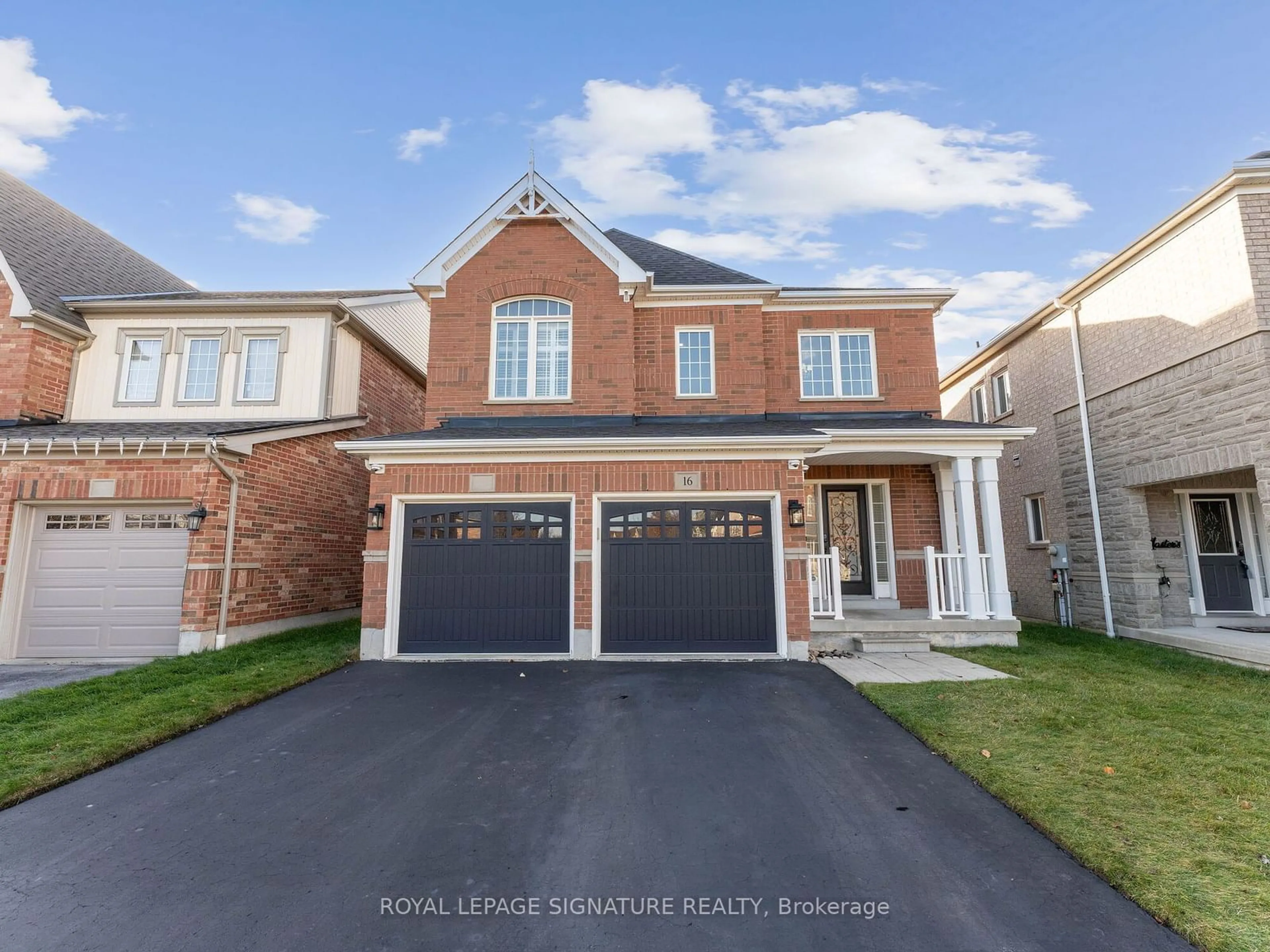 Frontside or backside of a home, the street view for 16 Howlett Cres, Ajax Ontario L1T 0A5