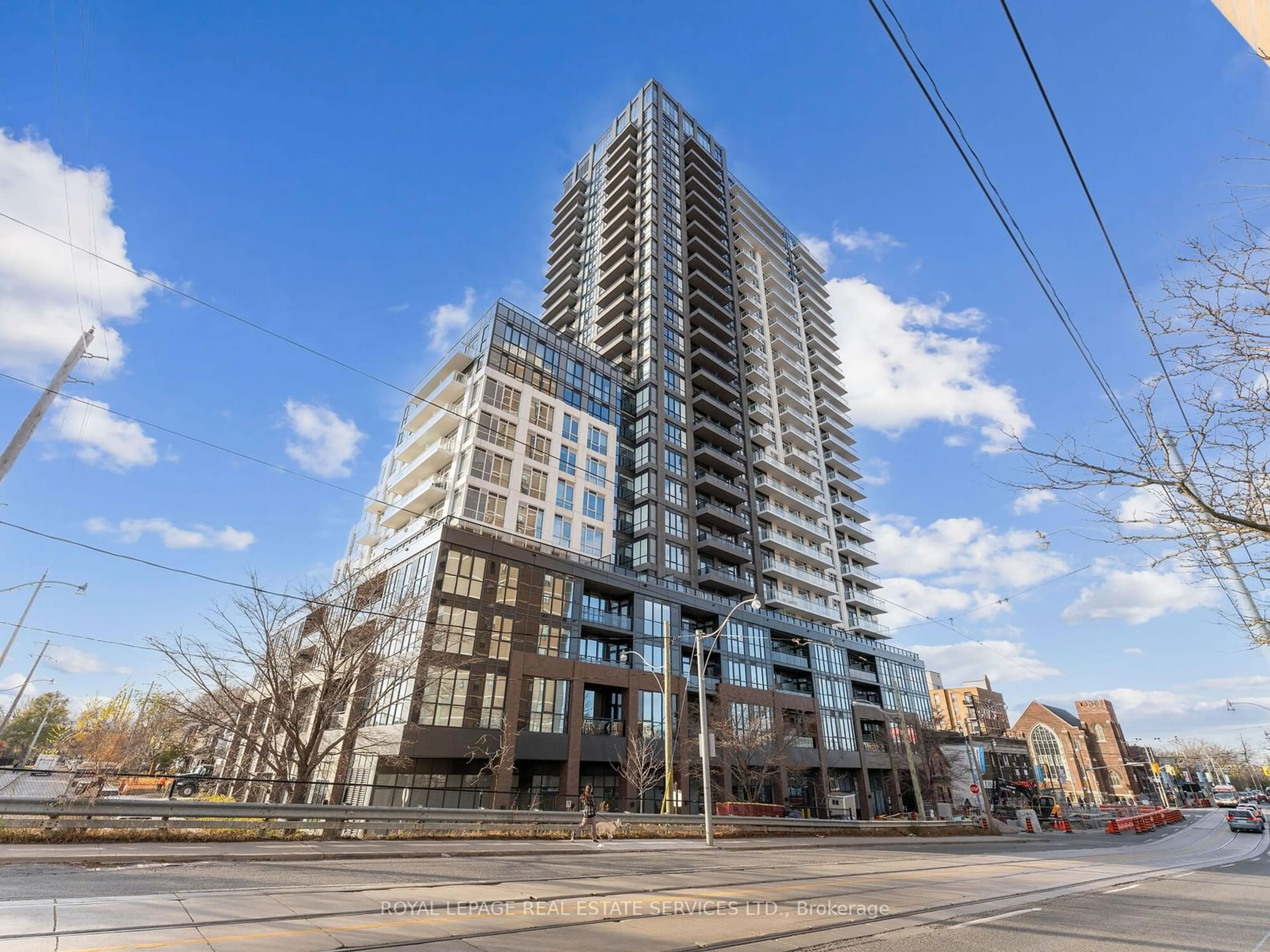 A pic from exterior of the house or condo, the front or back of building for 286 Main St #215, Toronto Ontario M4C 4X5