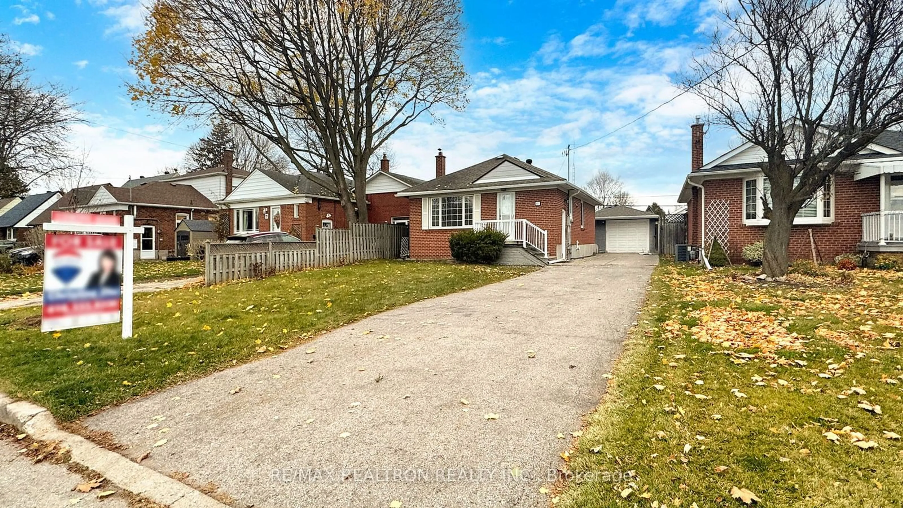 Frontside or backside of a home, the fenced backyard for 117 Marchington Circ, Toronto Ontario M1R 3M9