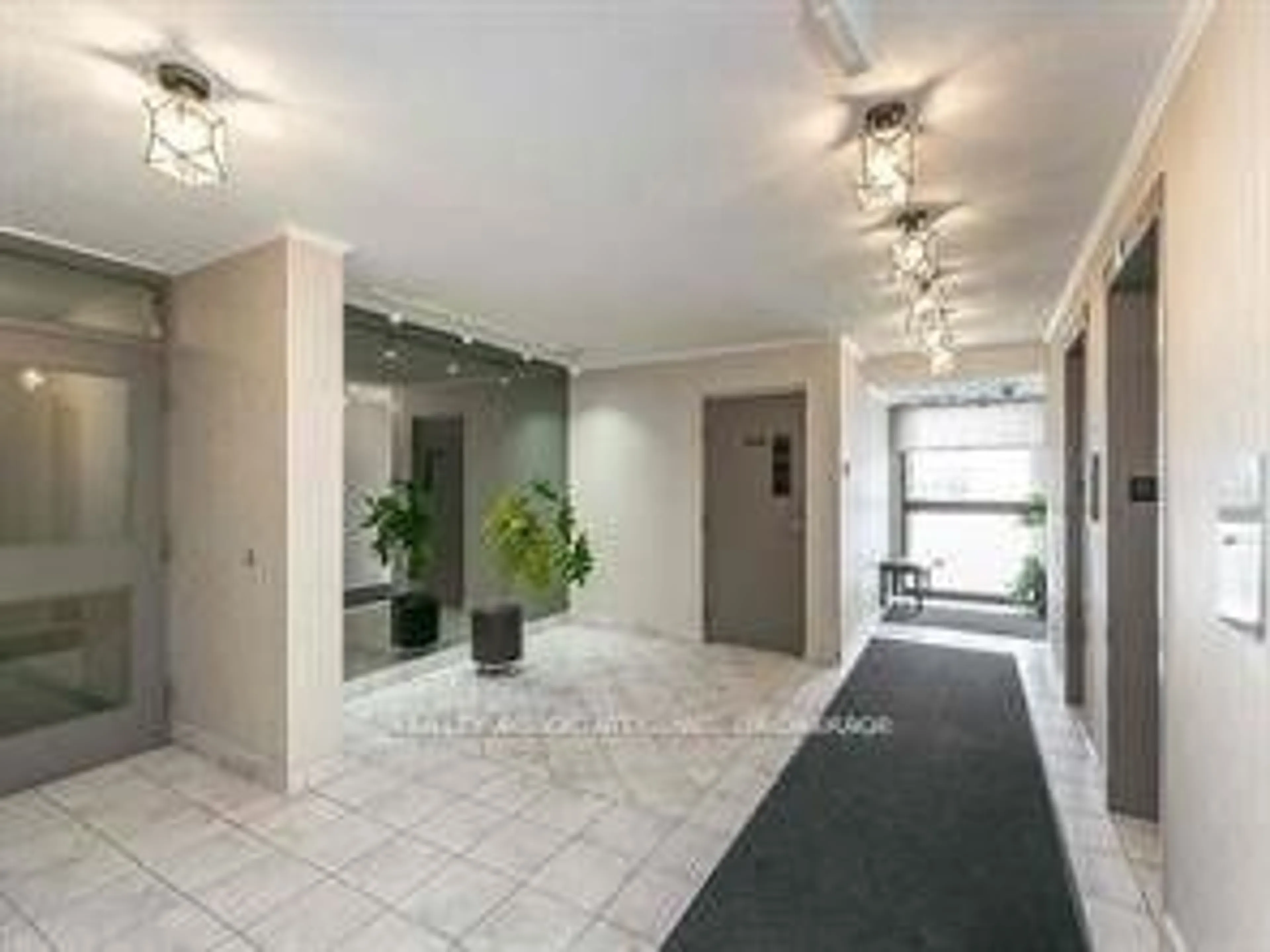 Indoor foyer for 2500 Bridletowne Circ #107, Toronto Ontario M1W 2V6