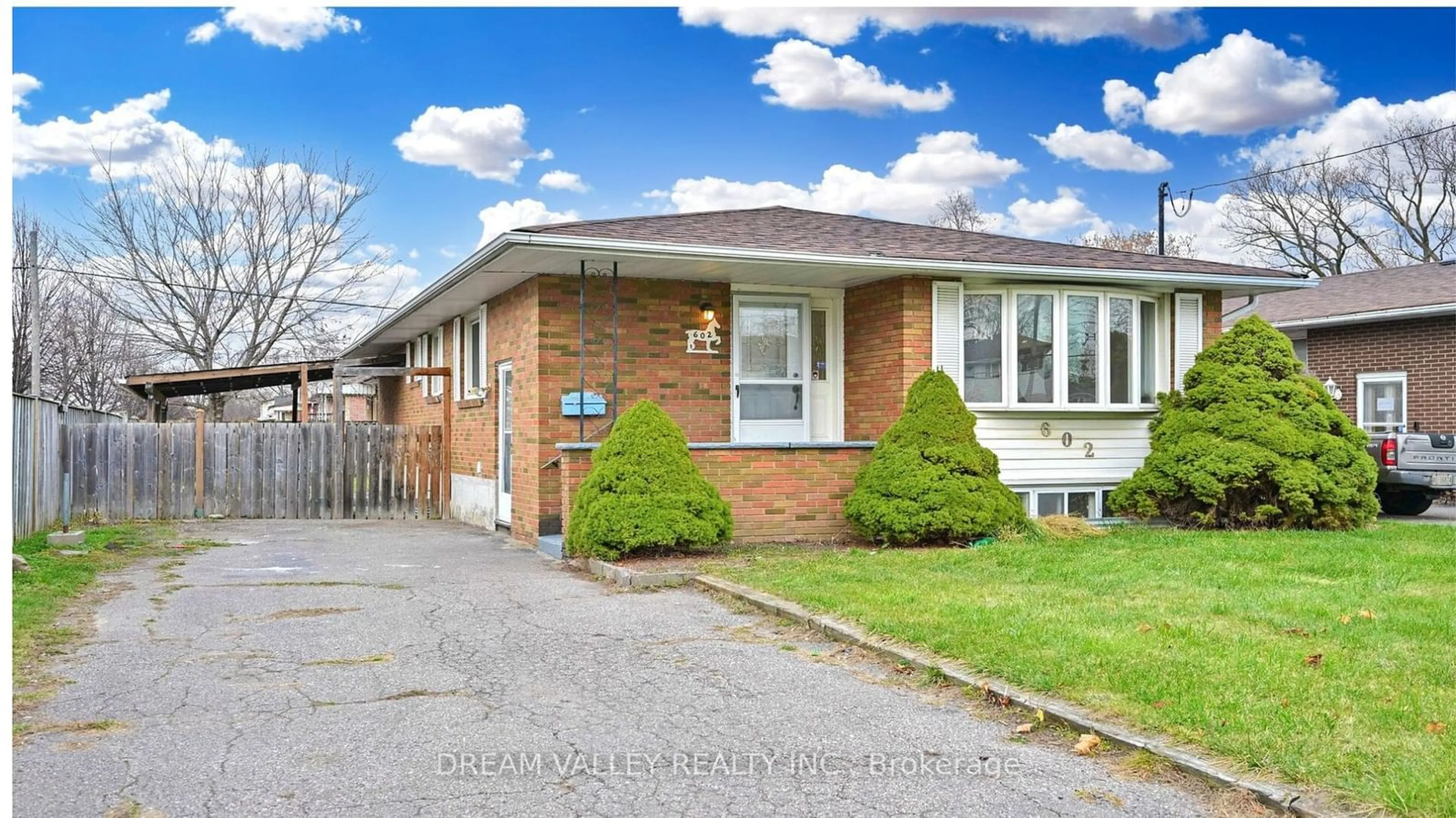 A pic from exterior of the house or condo, the street view for 602 Gibb St, Oshawa Ontario L1J 1Z5