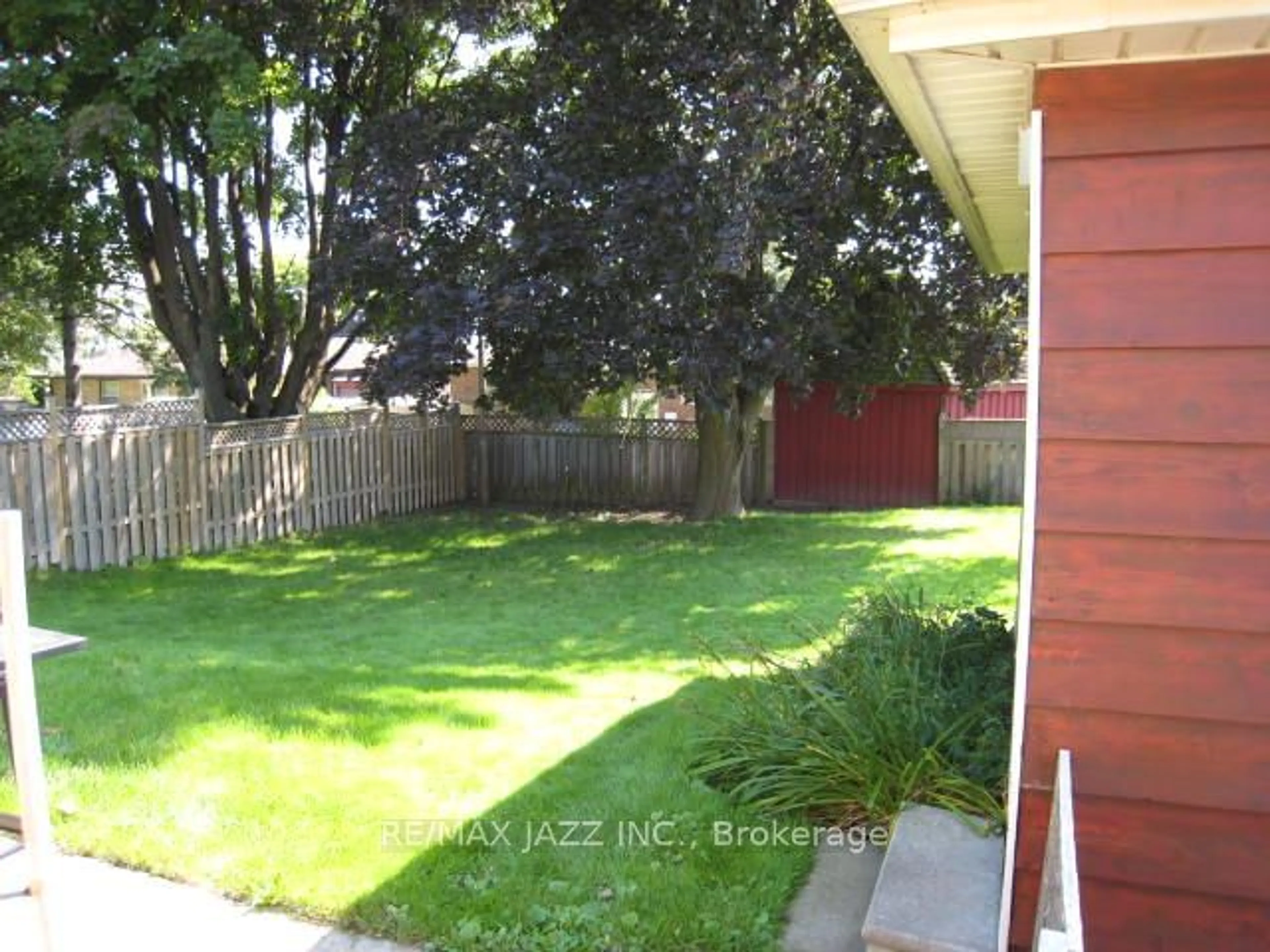 Frontside or backside of a home, the fenced backyard for 759 Tennyson Ave, Oshawa Ontario L1H 3K5