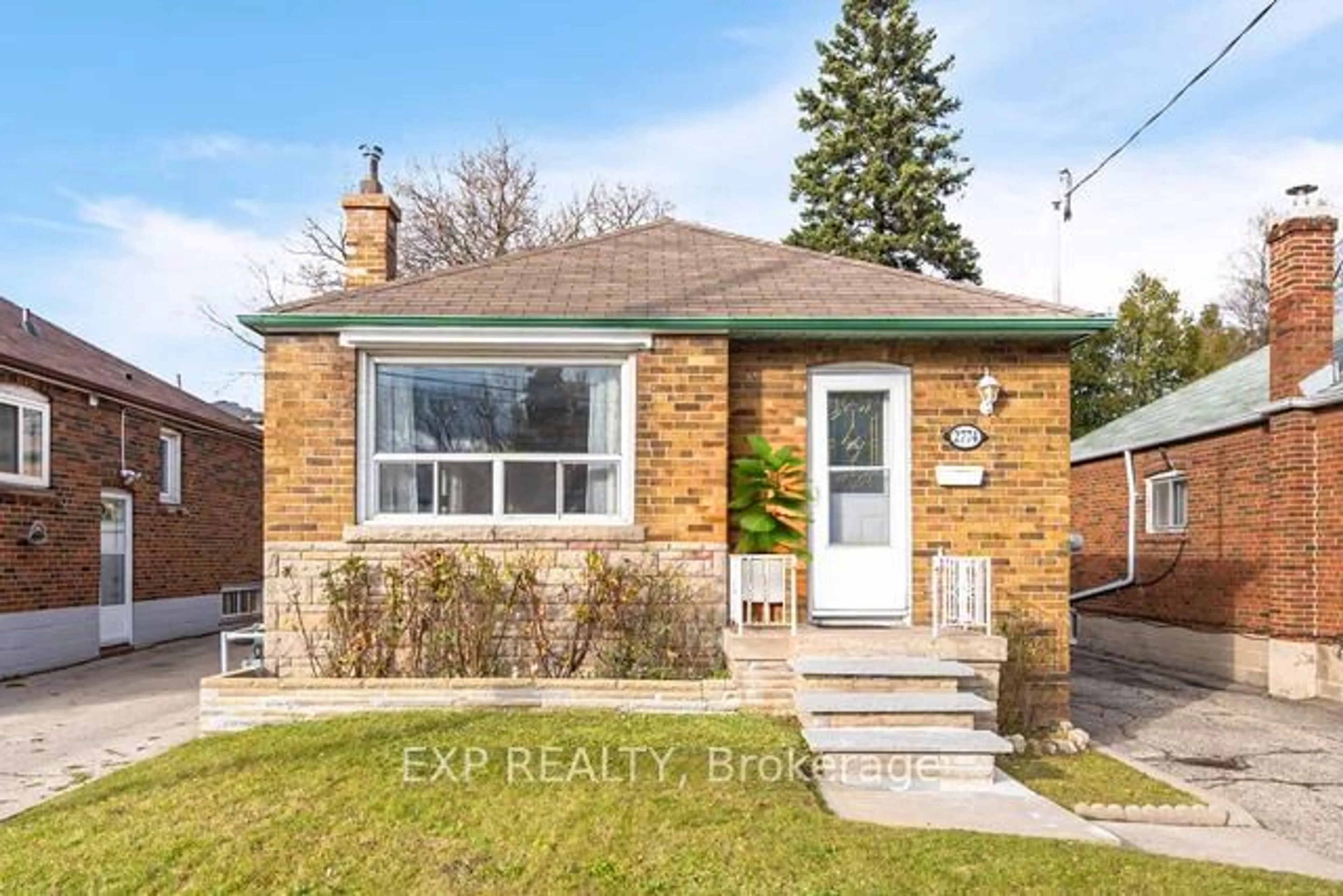 Home with brick exterior material for 2774 St Clair Ave, Toronto Ontario M4B 1M9