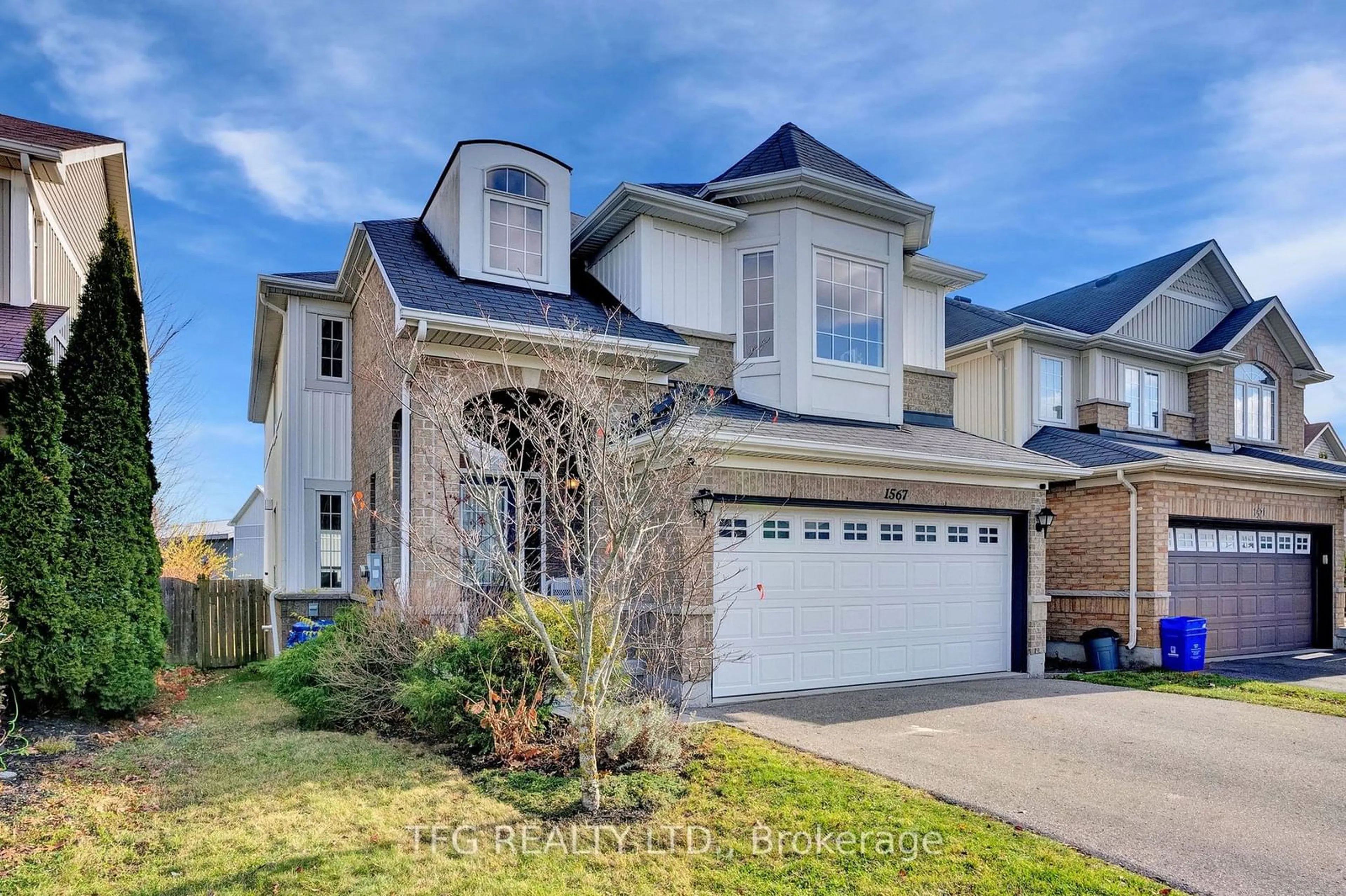 Frontside or backside of a home, the street view for 1567 Glenbourne Dr, Oshawa Ontario L1K 0M3