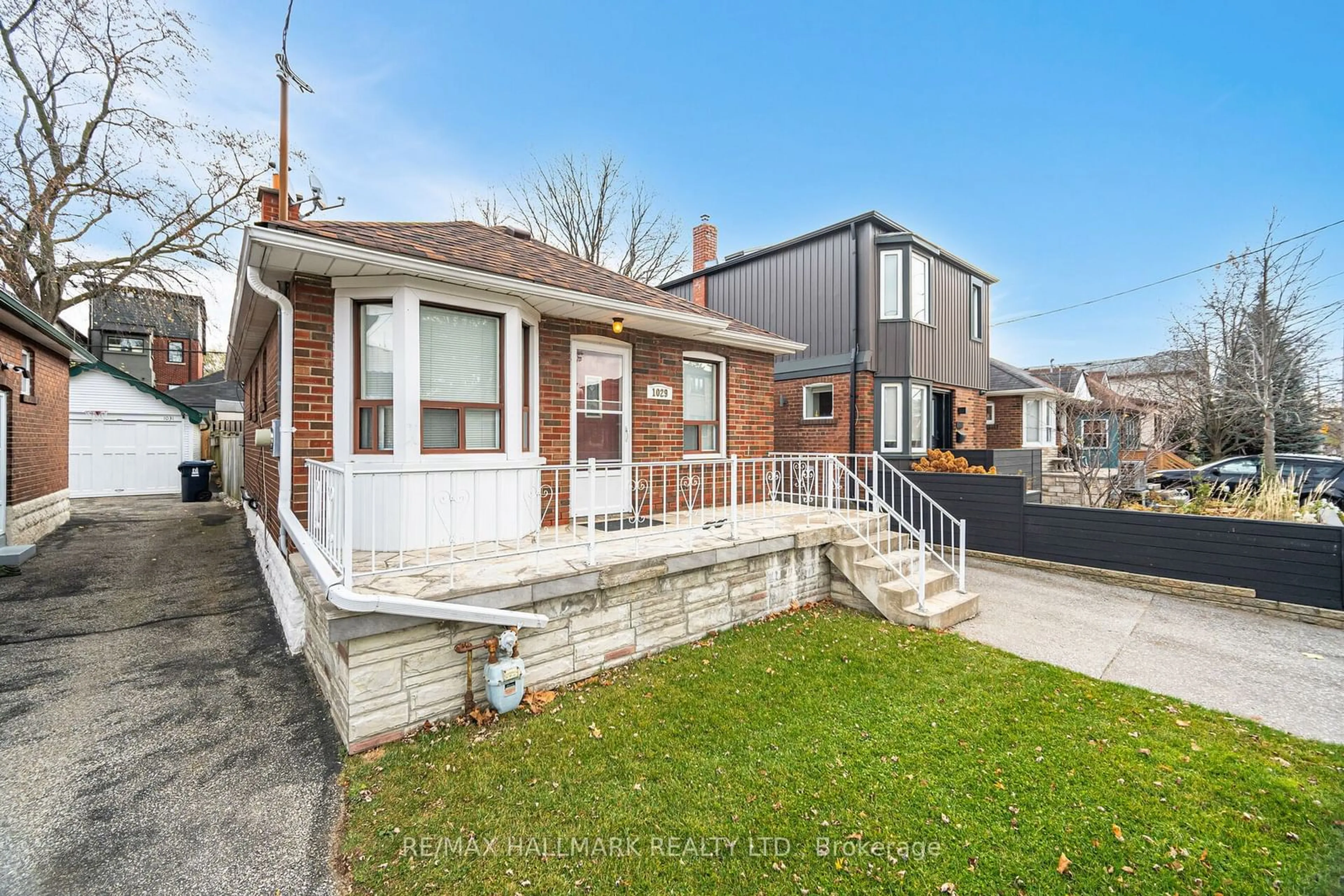 Frontside or backside of a home, the fenced backyard for 1029 Greenwood Ave, Toronto Ontario M4J 4C9