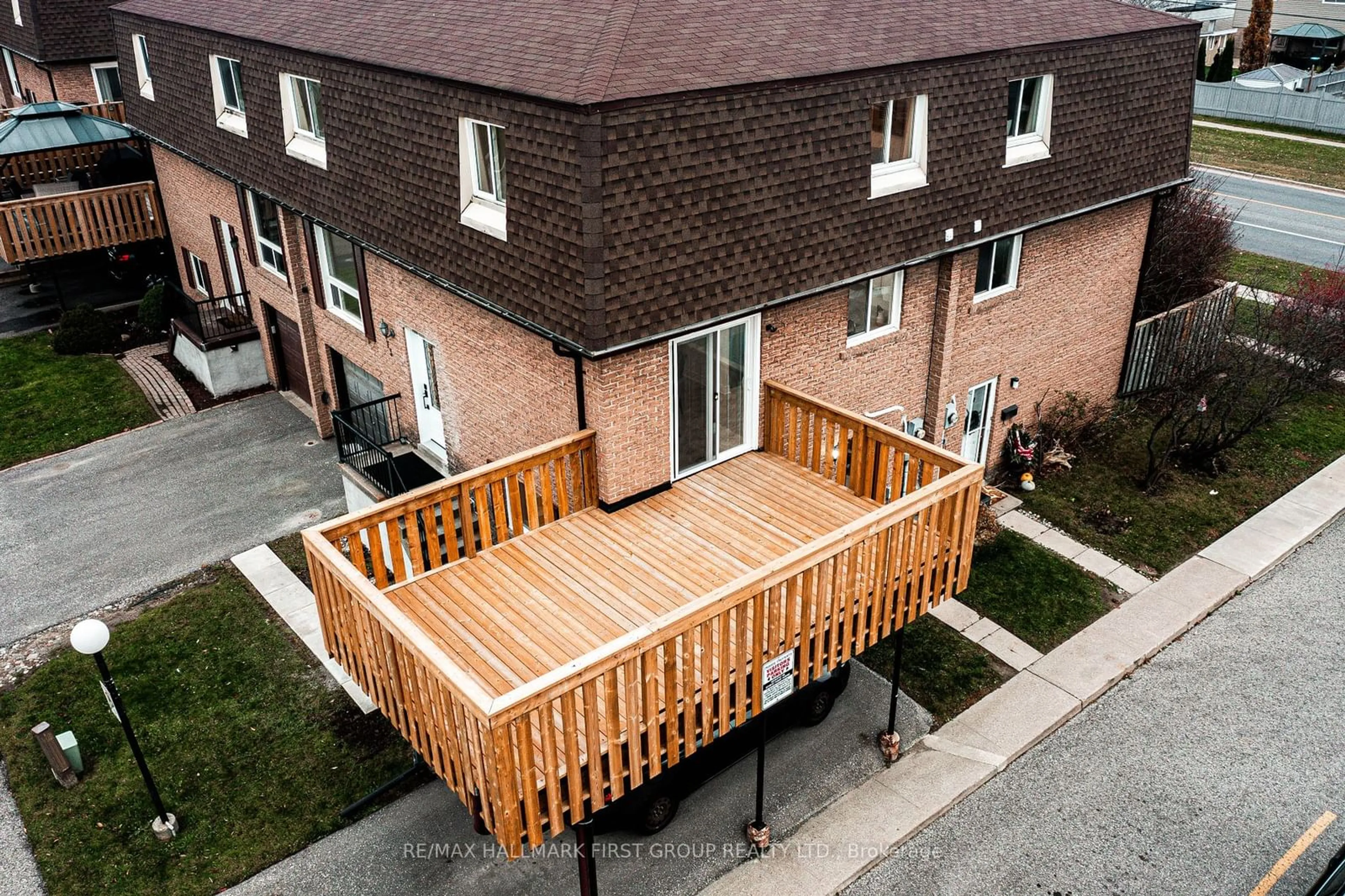 Frontside or backside of a home, the fenced backyard for 966 Adelaide Ave #73, Oshawa Ontario L1K 1L2