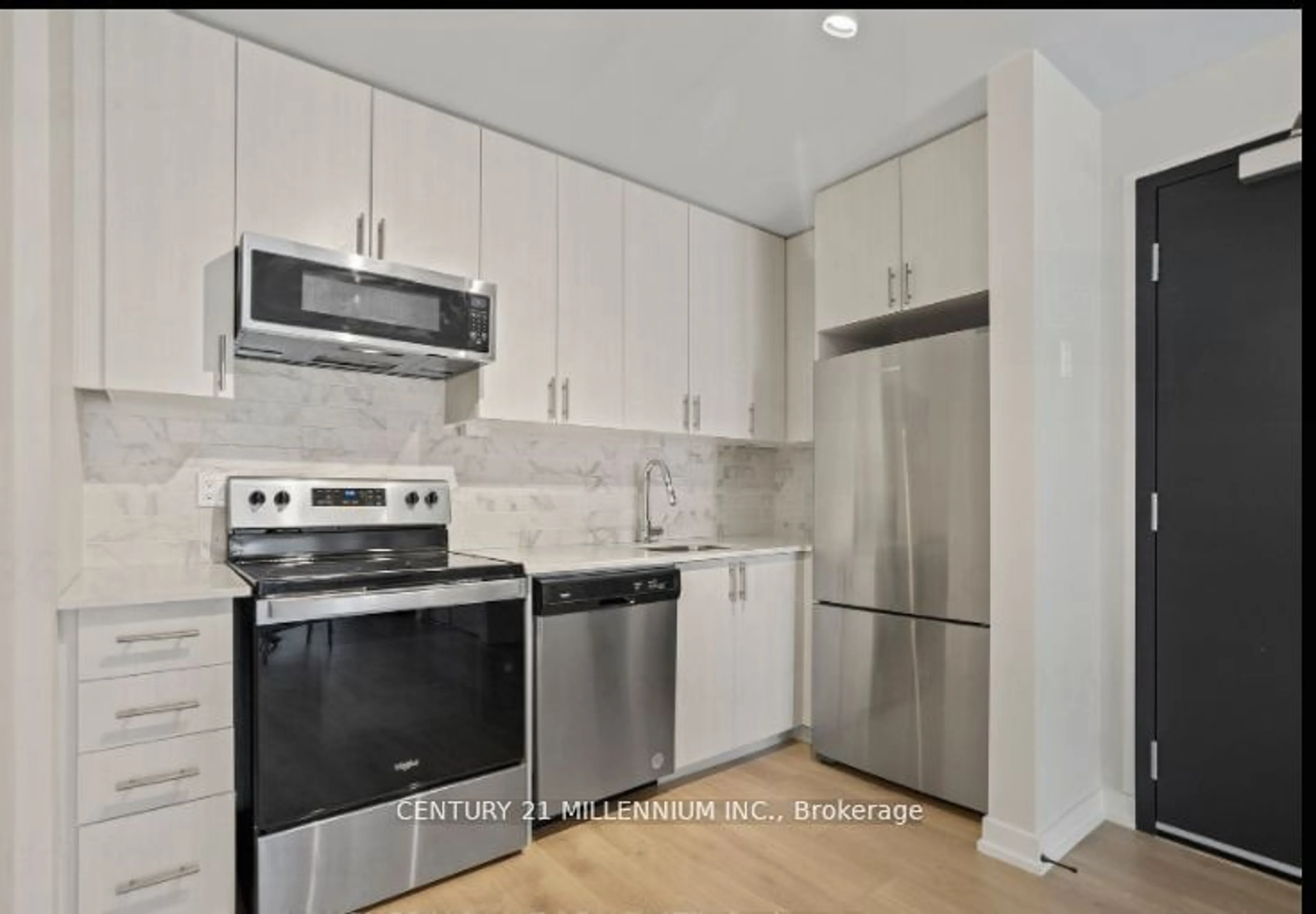 Standard kitchen, wood floors, mountain for 3686 St Clair Ave #108, Toronto Ontario M1M 1T2