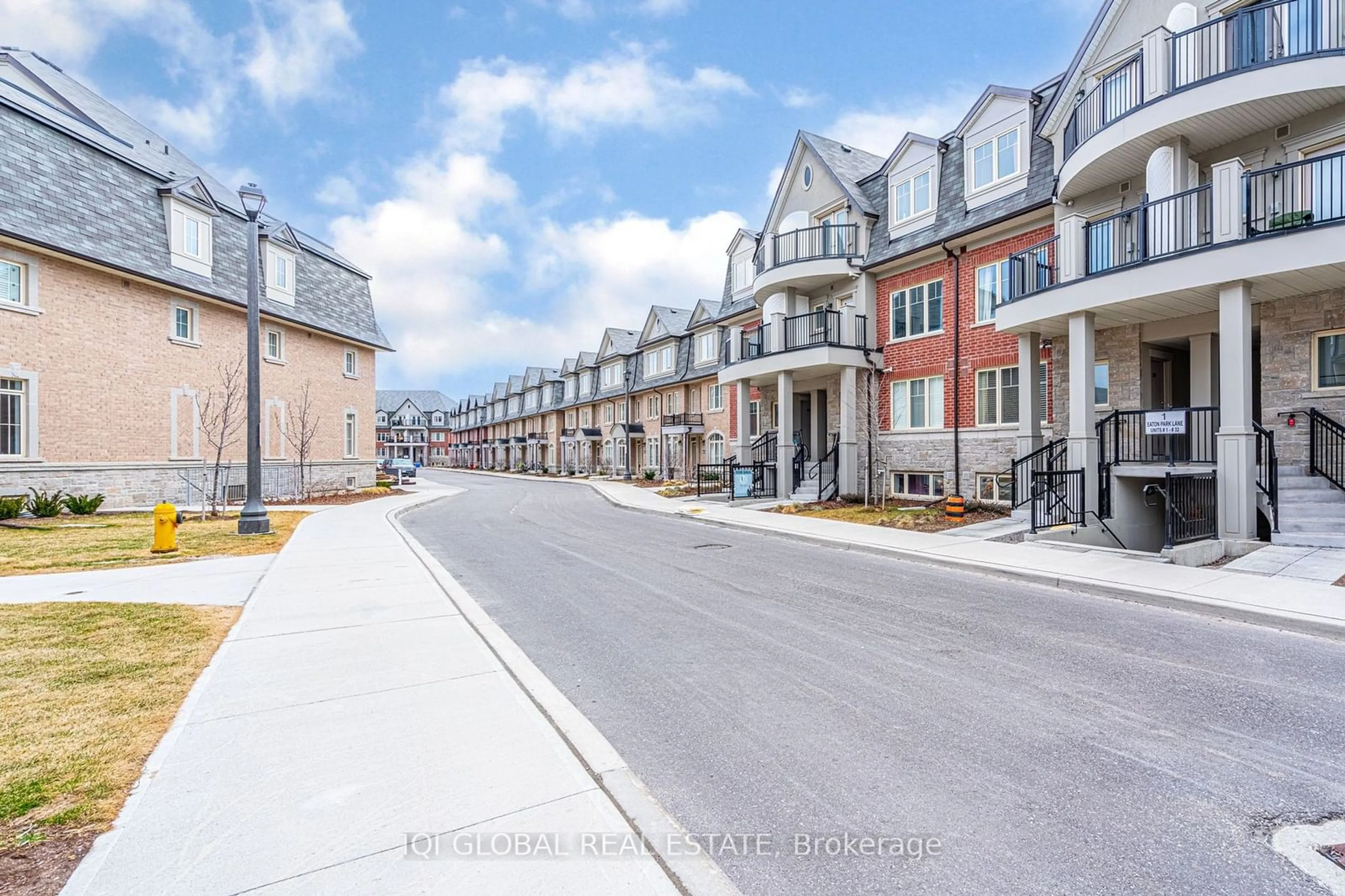 A pic from exterior of the house or condo, the street view for 17 Eaton Park Lane #28, Toronto Ontario M1W 0A5