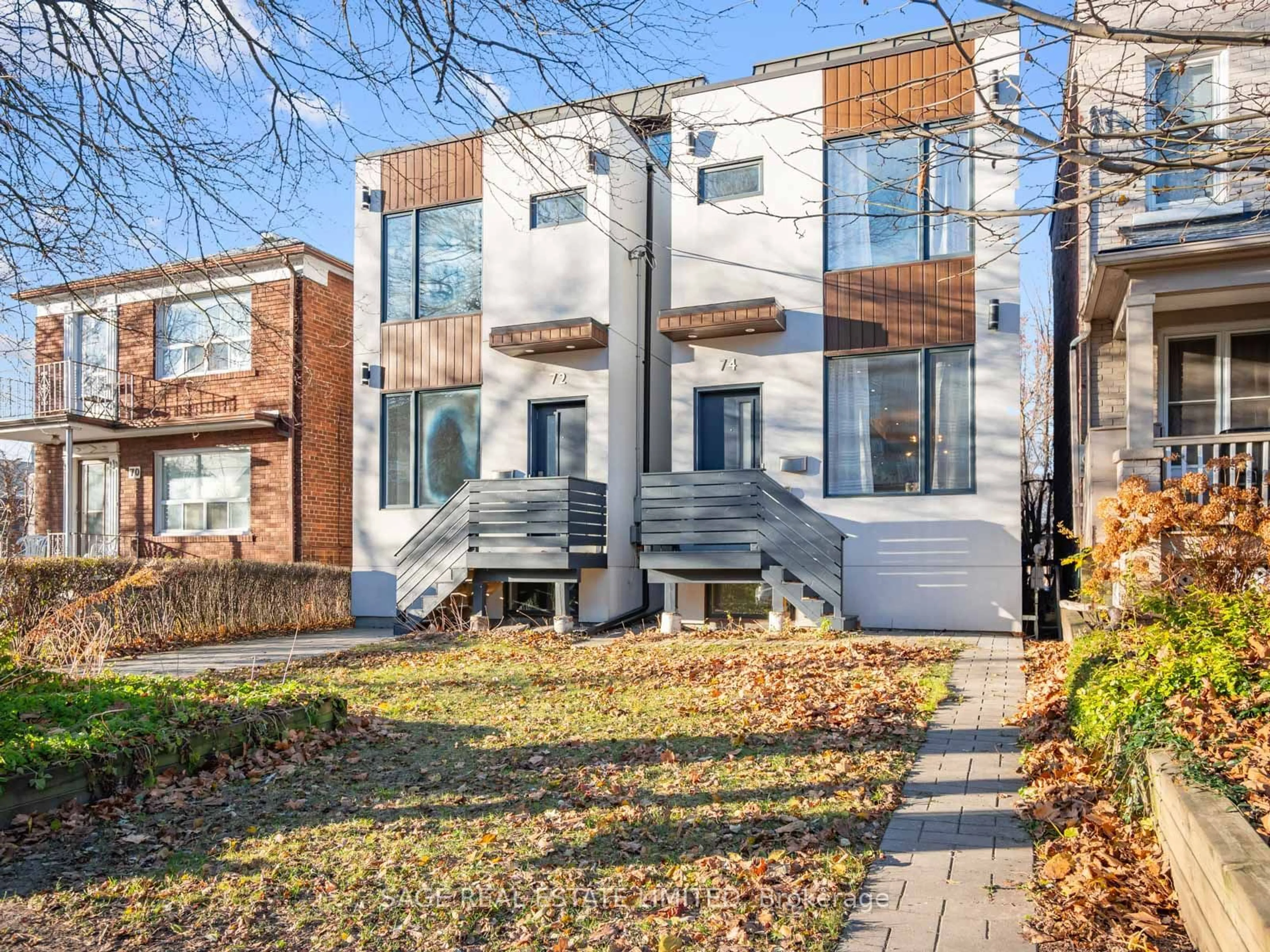 Home with brick exterior material for 74 Curzon St, Toronto Ontario M4M 3B4