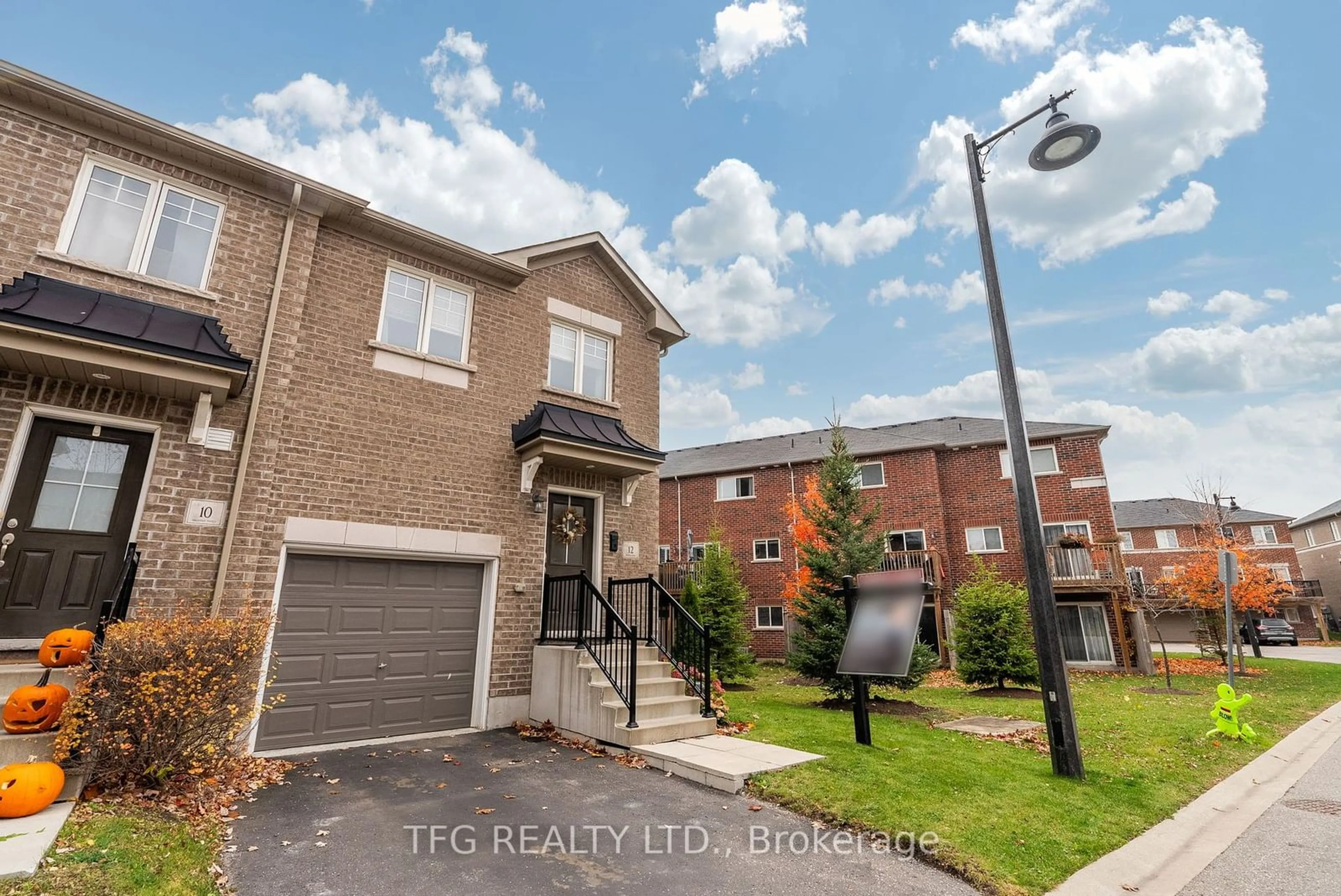 A pic from exterior of the house or condo, the street view for 12 Ken Bromley Lane, Clarington Ontario L1C 0S4