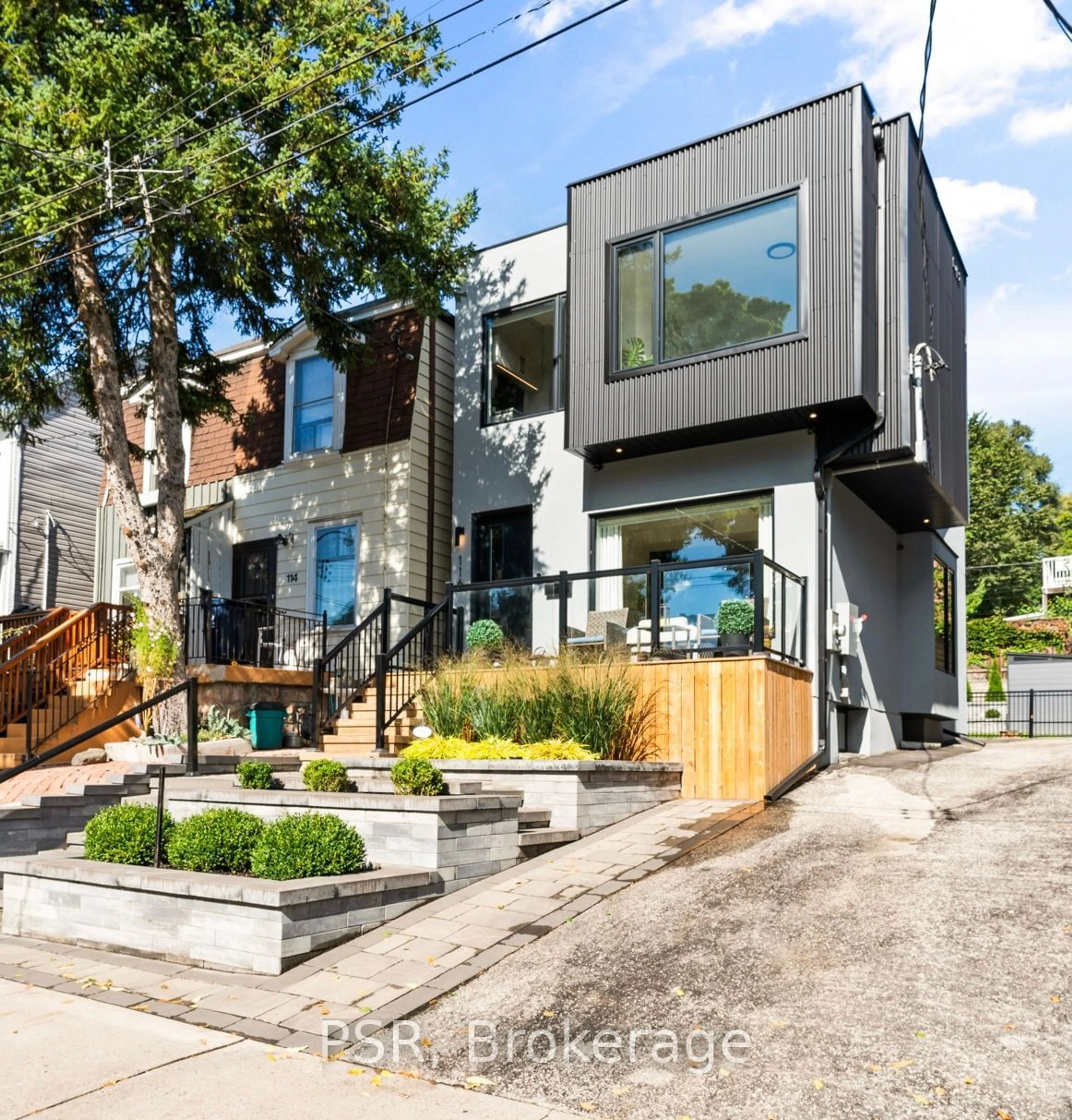 Frontside or backside of a home for 116 Walpole Ave, Toronto Ontario M4L 2J3