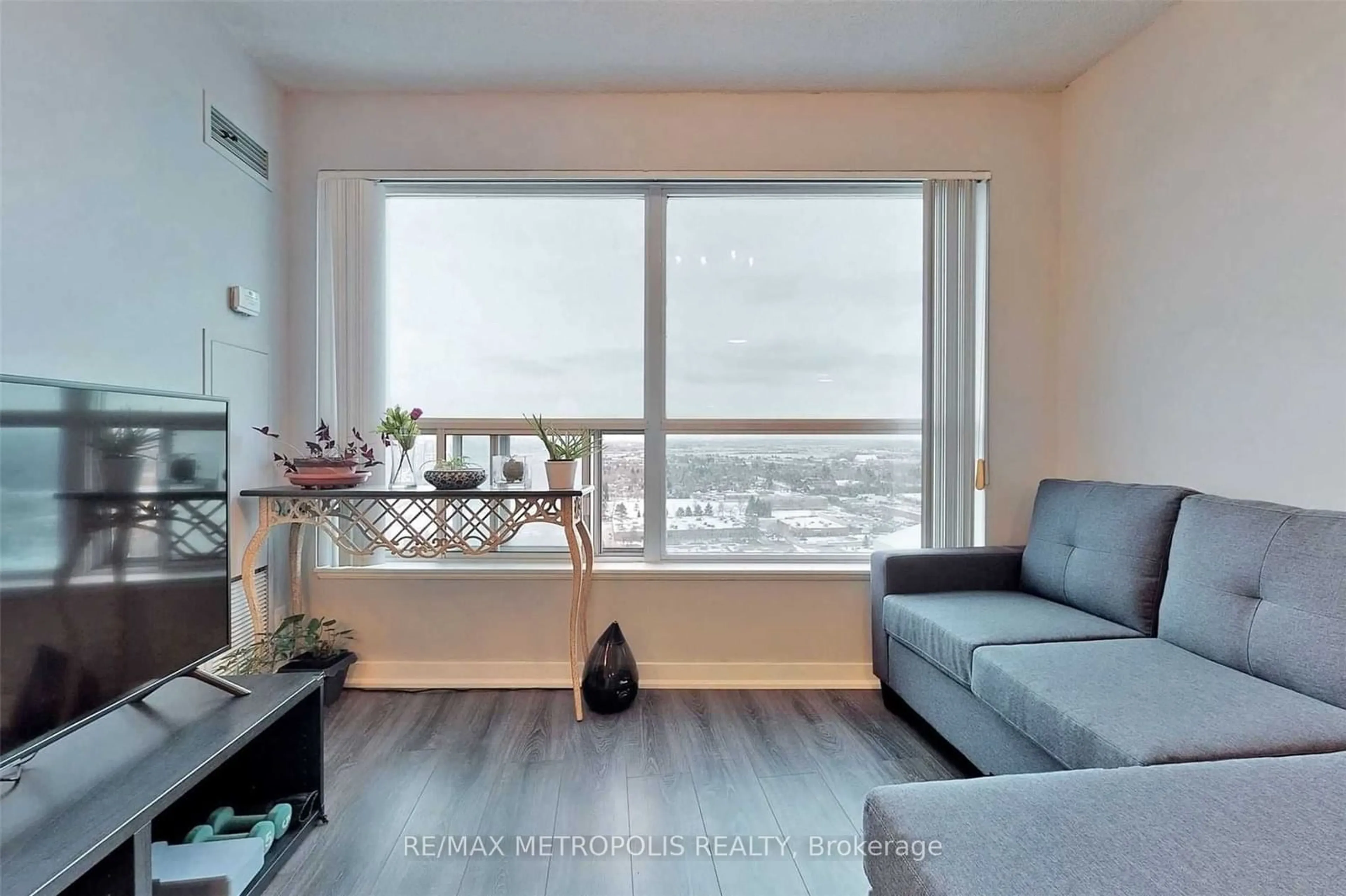 Living room, wood floors for 36 Lee Centre Dr #2602, Toronto Ontario M1H 3K2