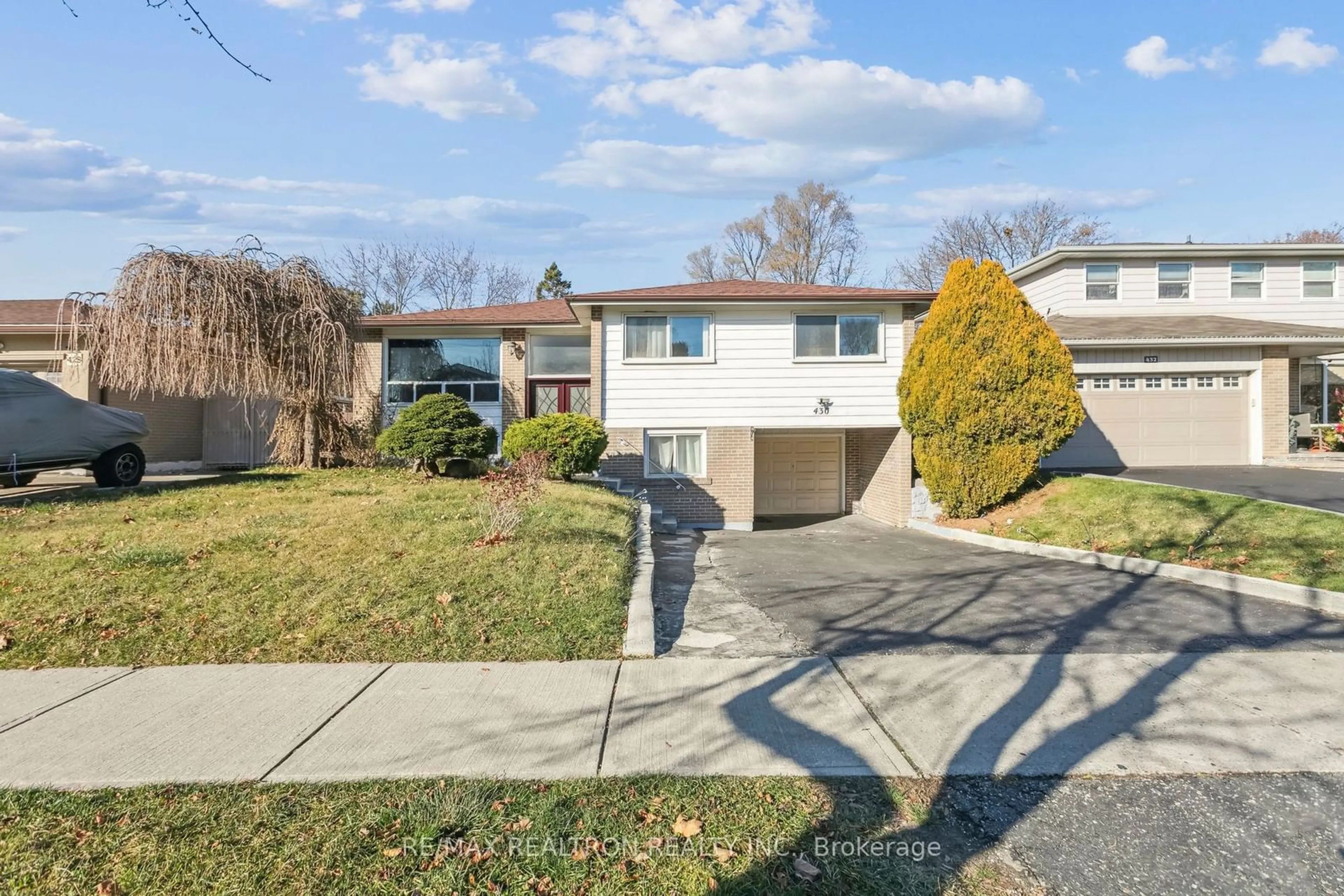 Frontside or backside of a home, the street view for 430 Military Tr, Toronto Ontario M1E 4E7