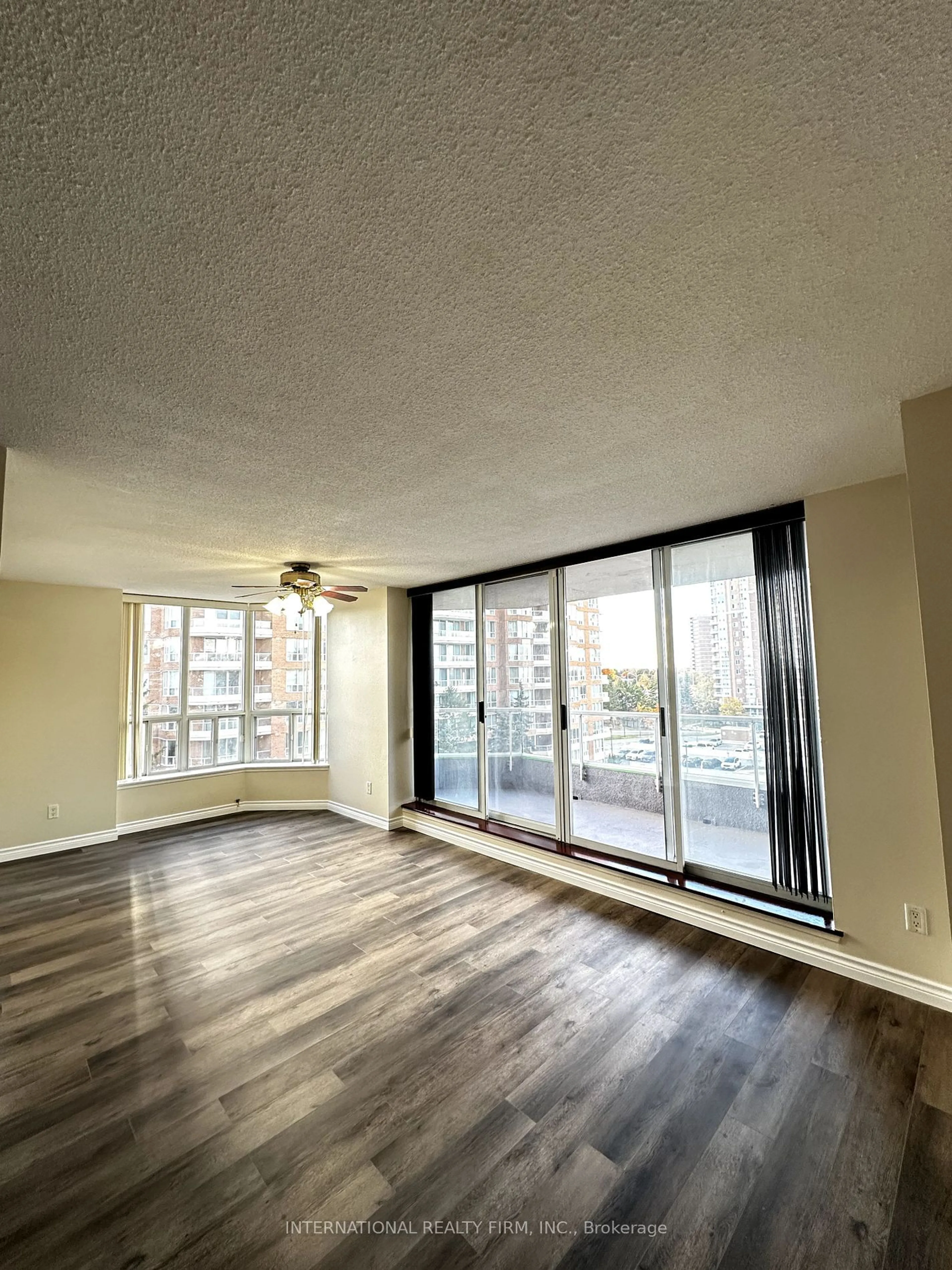 A pic of a room, wood floors for 410 Mclevin Ave #708, Toronto Ontario M1B 5J5