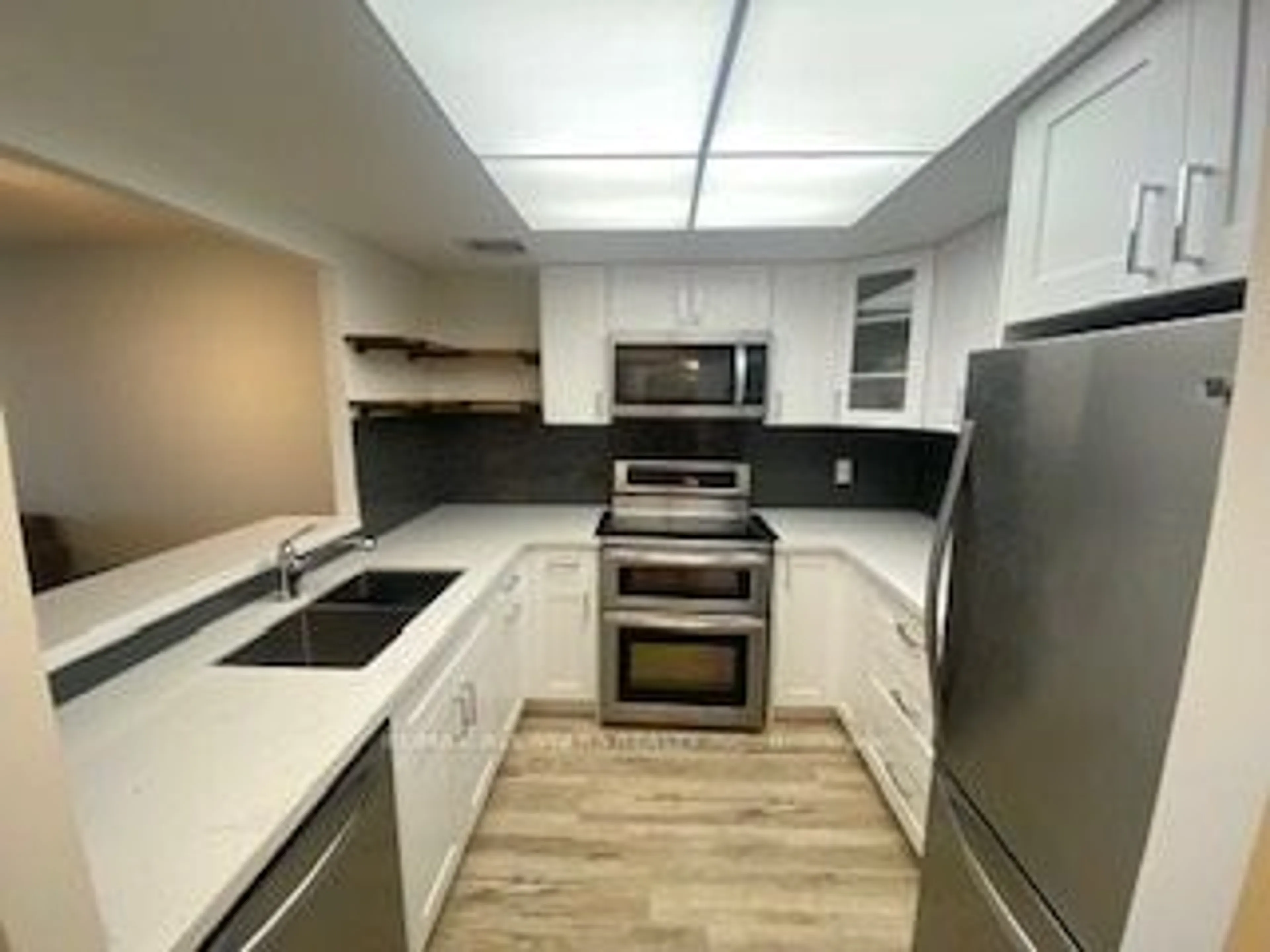 Kitchen, wood floors for 5 Greystone Walk Dr #1216, Toronto Ontario M1K 5J5