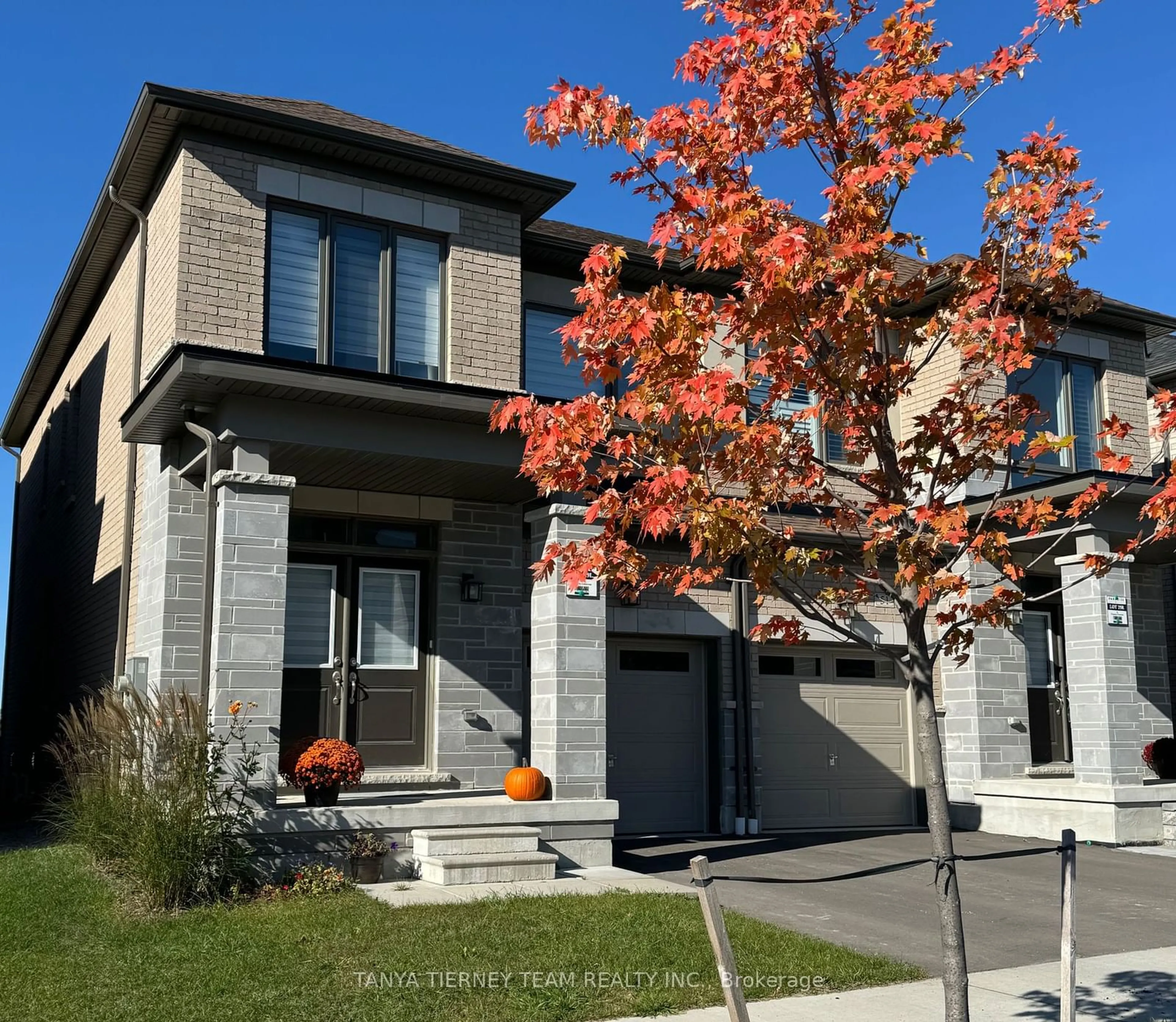 Frontside or backside of a home, the street view for 49 Conarty Cres, Whitby Ontario L1P 0L4