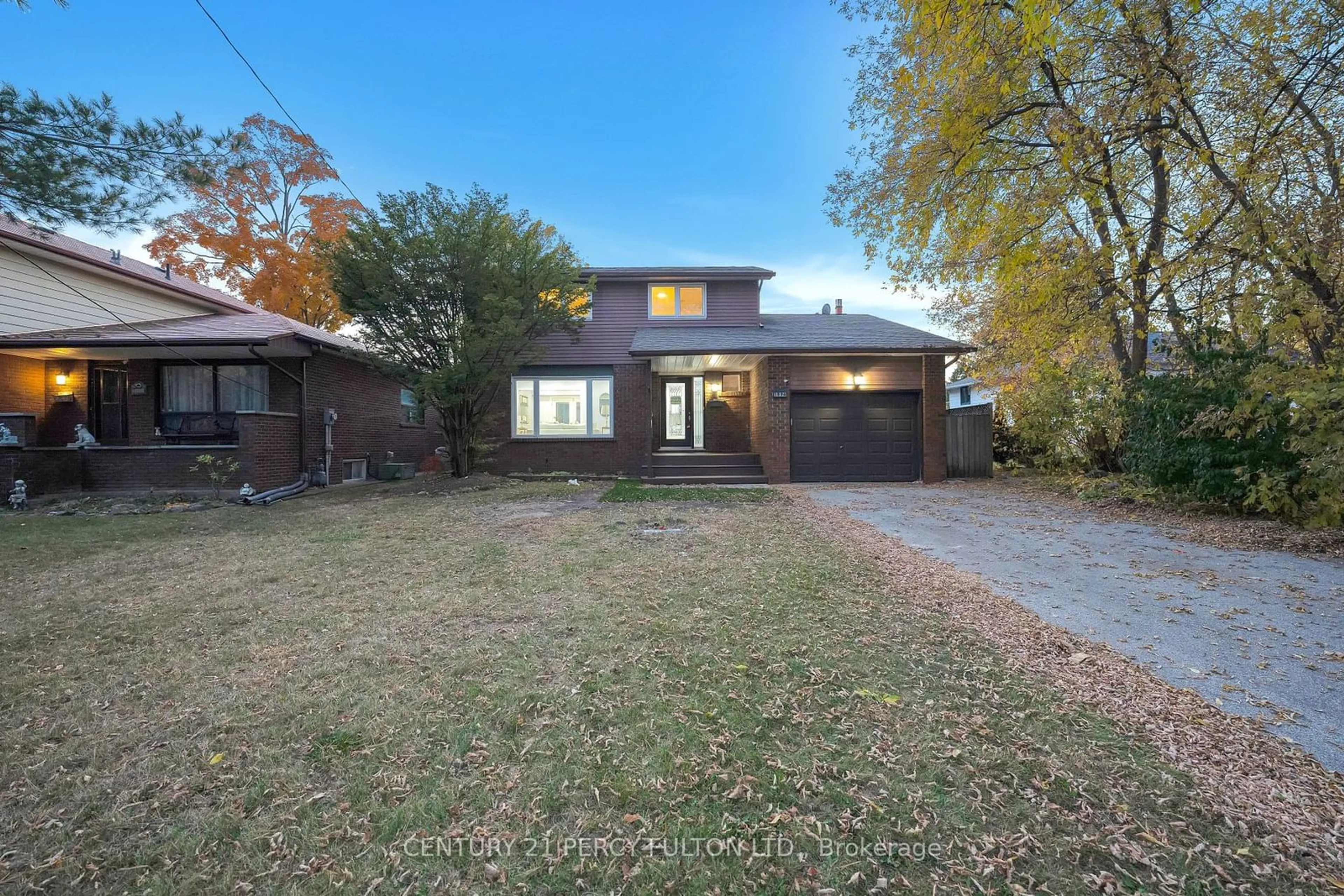 Frontside or backside of a home, the fenced backyard for 1994 Fairport Rd, Pickering Ontario L1V 1T6