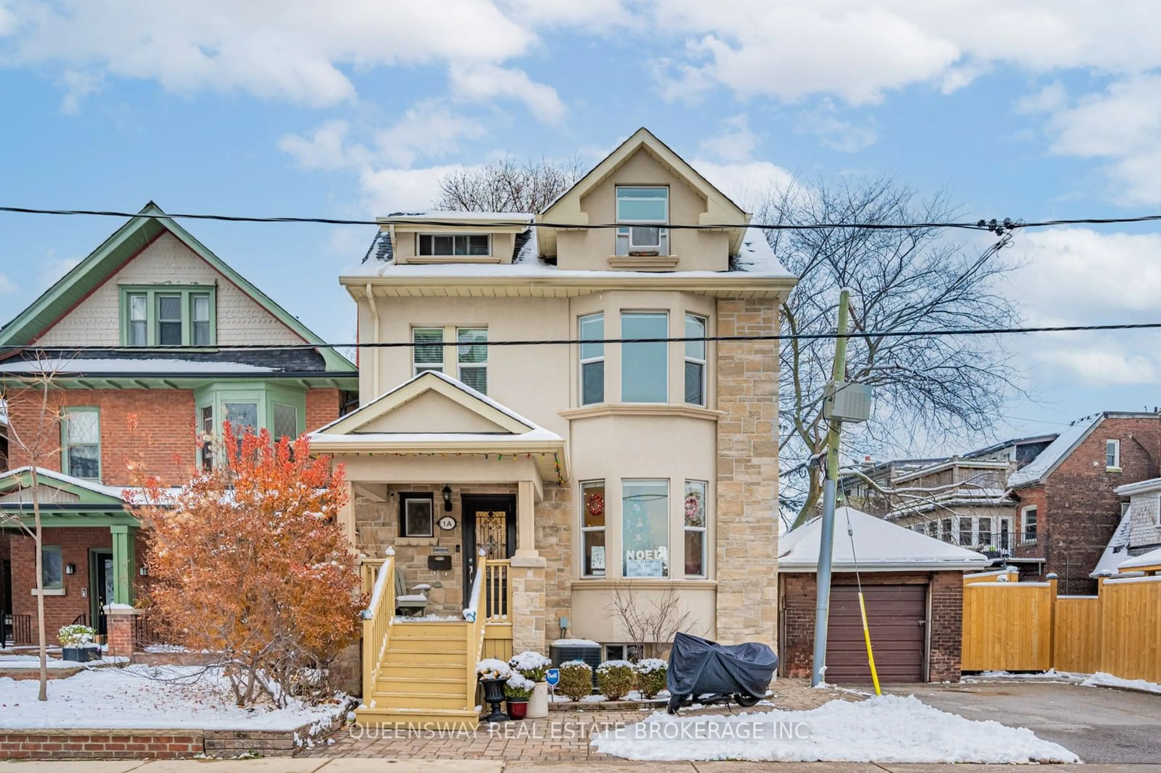 Frontside or backside of a home, the street view for 1A Hogarth Ave, Toronto Ontario M4K 1J8