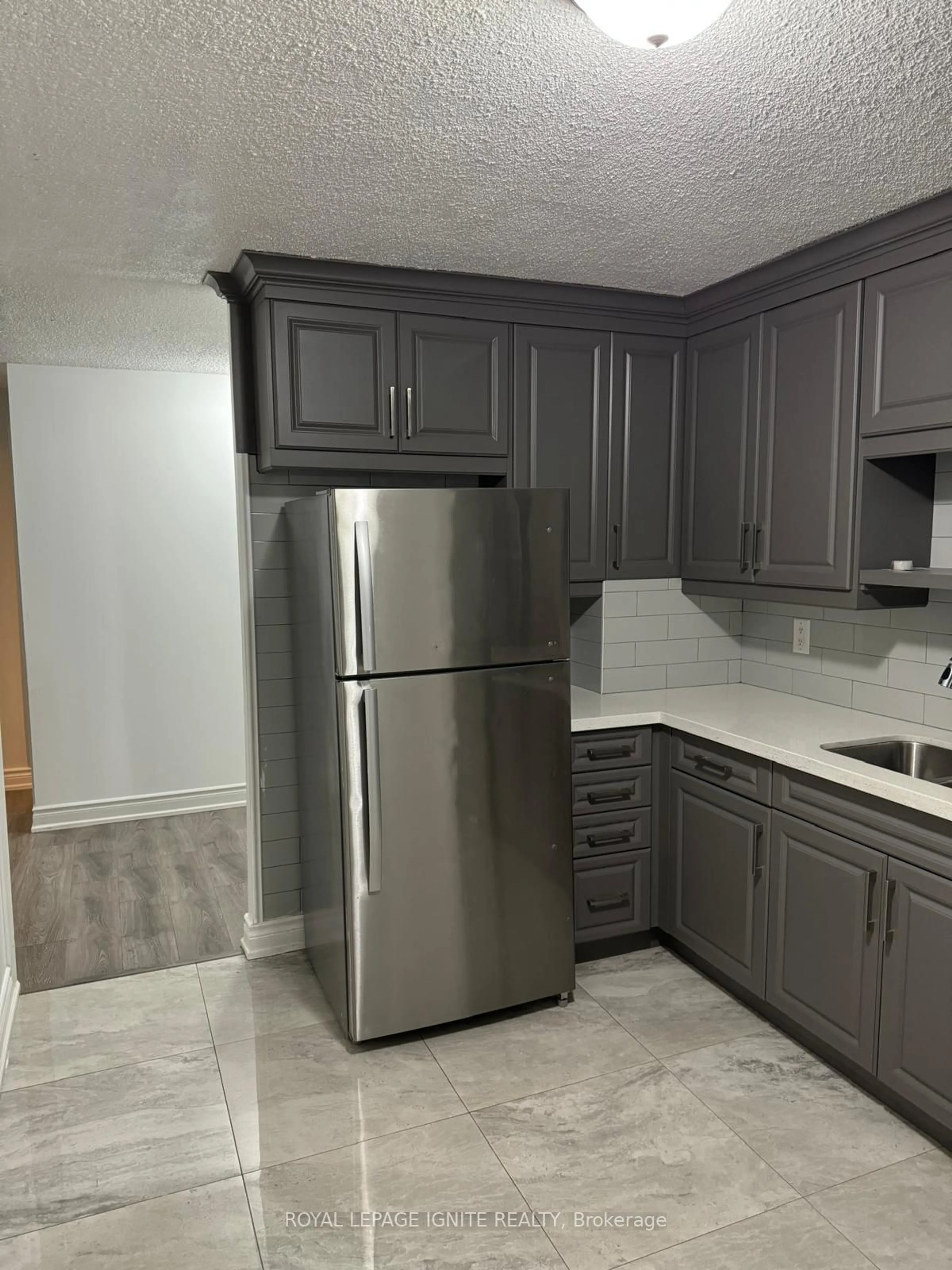 Standard kitchen, cement floor, cottage for 100 Wingarden Crt #1913, Toronto Ontario M1B 2P4