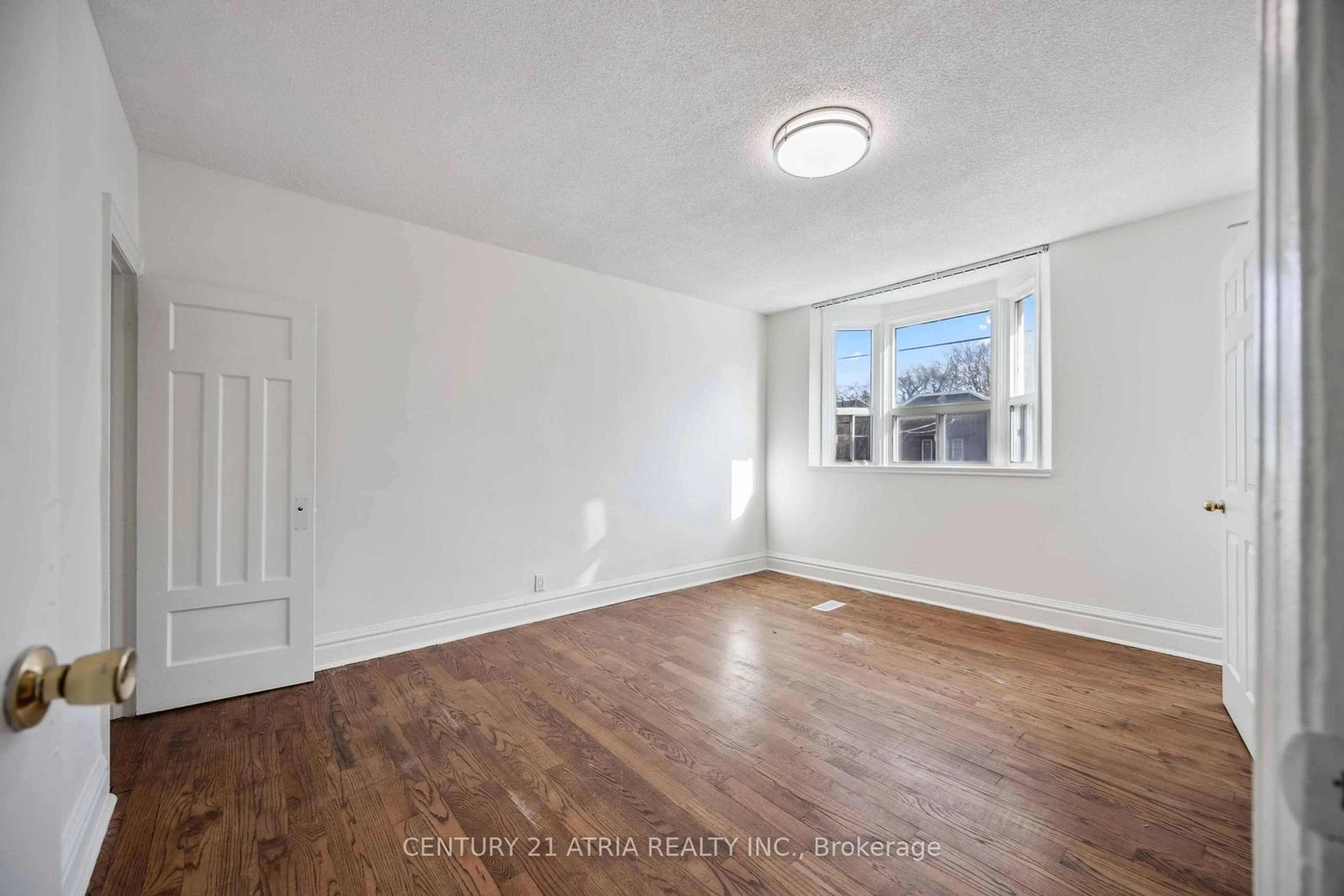 A pic of a room, wood floors for 1860 Gerrard St, Toronto Ontario M4L 2B7