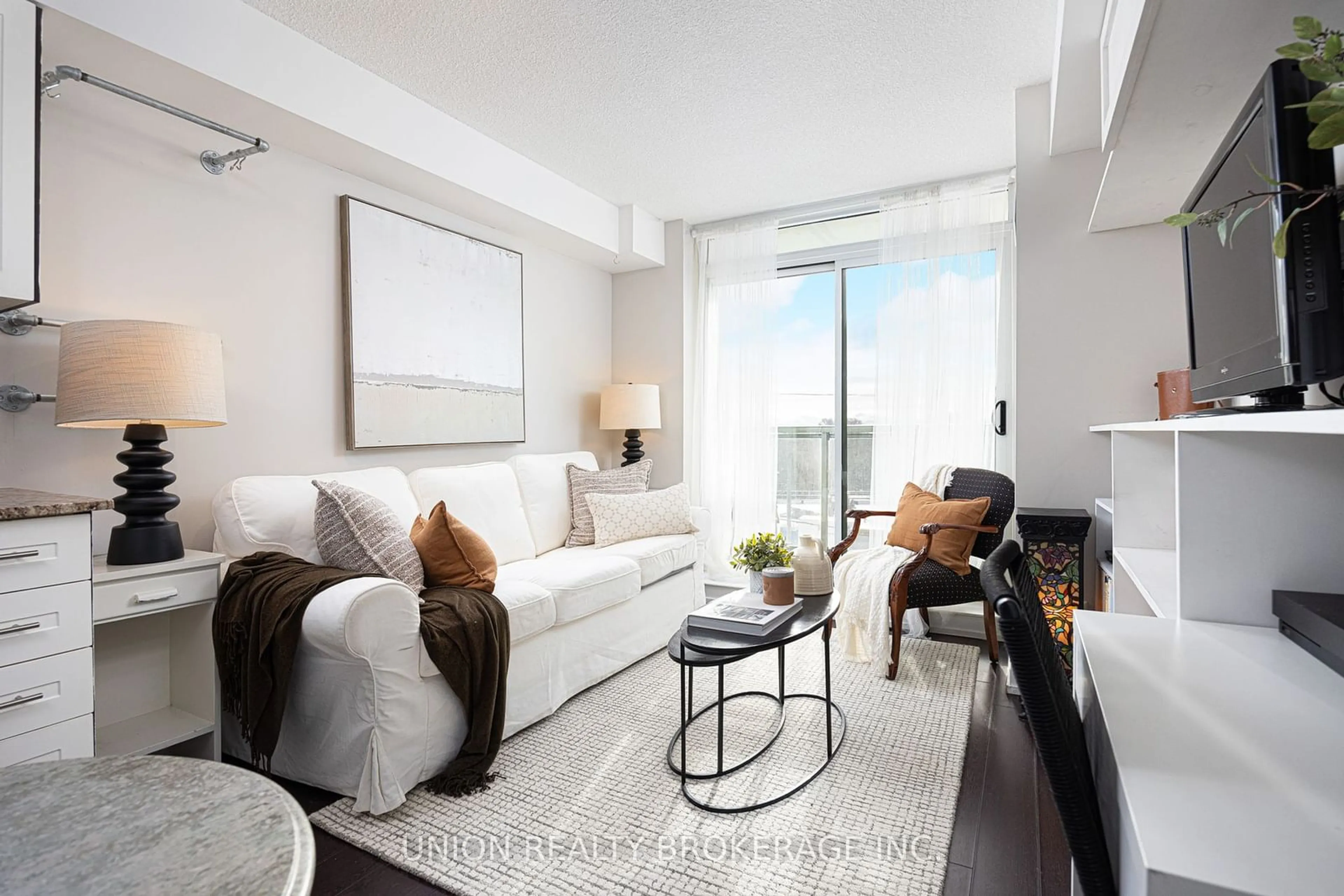 Living room, wood floors for 3520 Danforth Ave #408, Toronto Ontario M1L 1E5