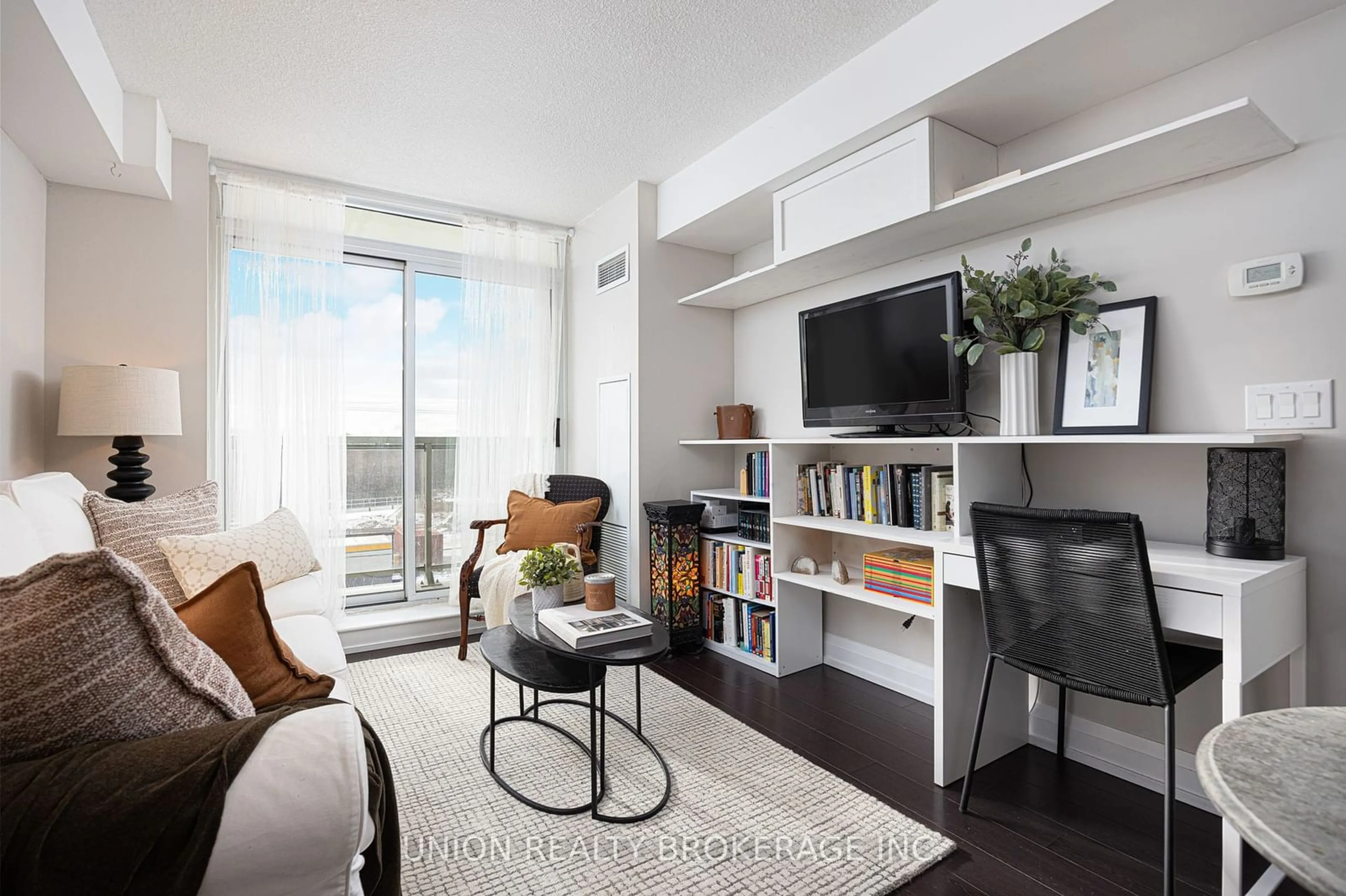 Living room, wood floors for 3520 Danforth Ave #408, Toronto Ontario M1L 1E5