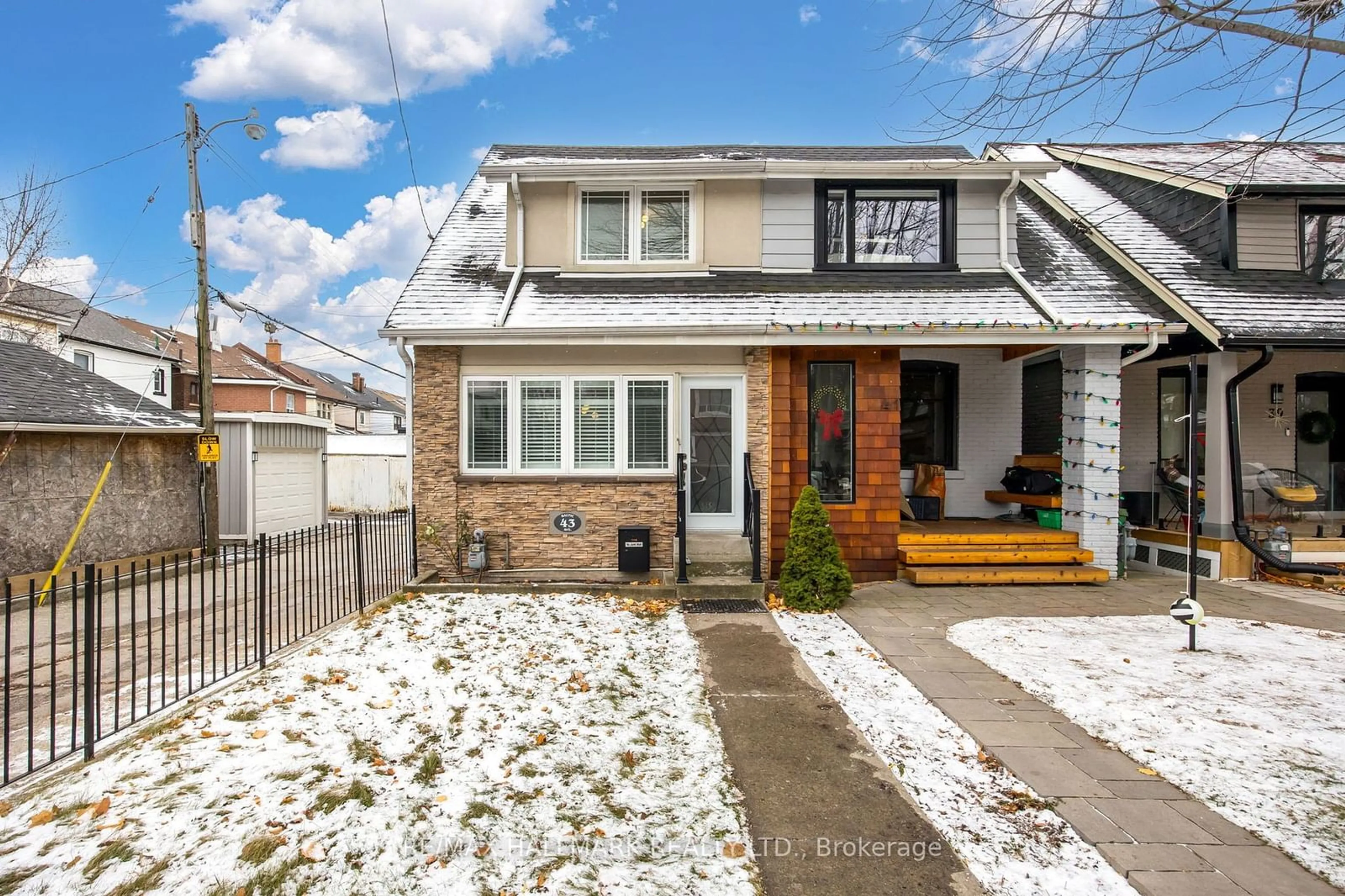 A pic from exterior of the house or condo, the fenced backyard for 43 Baltic Ave, Toronto Ontario M4J 1S1