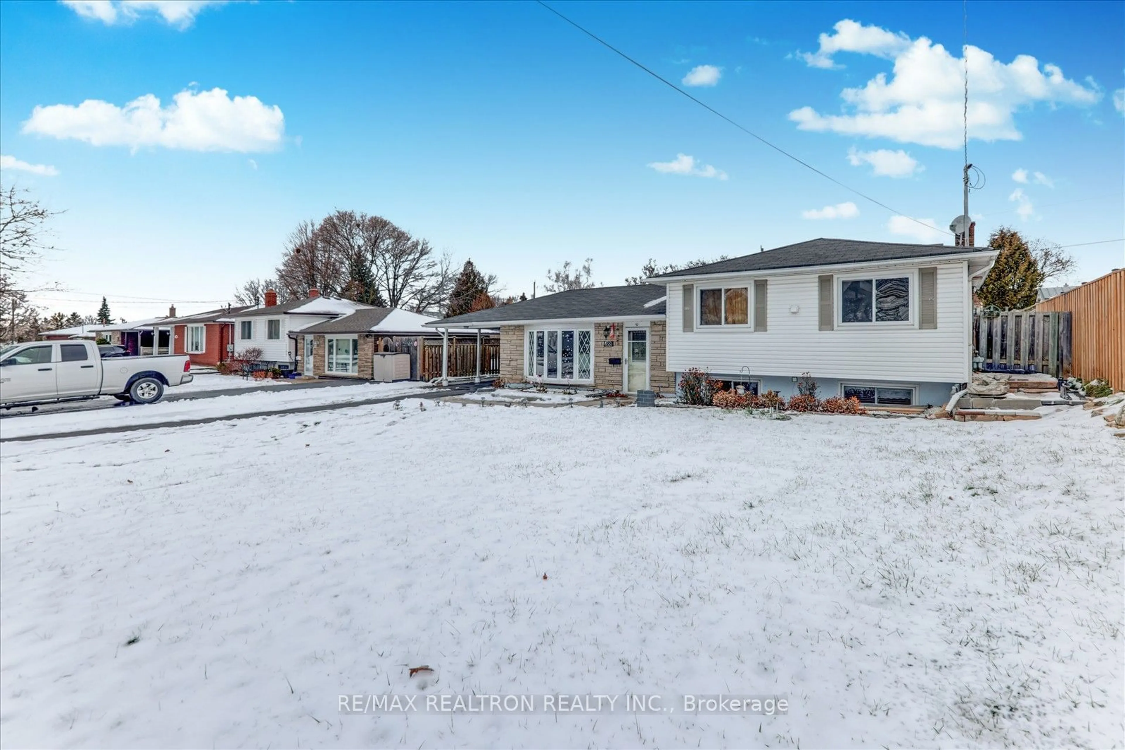 Frontside or backside of a home, the fenced backyard for 1188 Wakefield Cres, Oshawa Ontario L1H 1V9