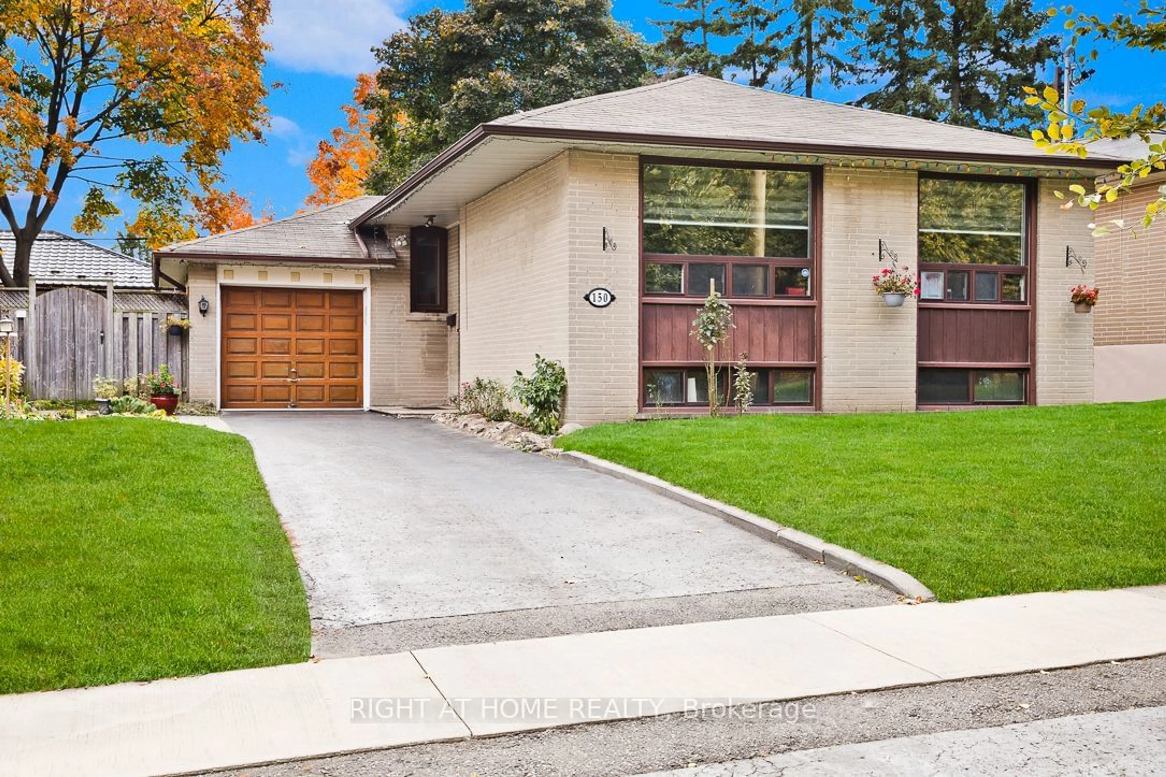 Frontside or backside of a home, the street view for 150 Lord Roberts Dr, Toronto Ontario M1K 3W8