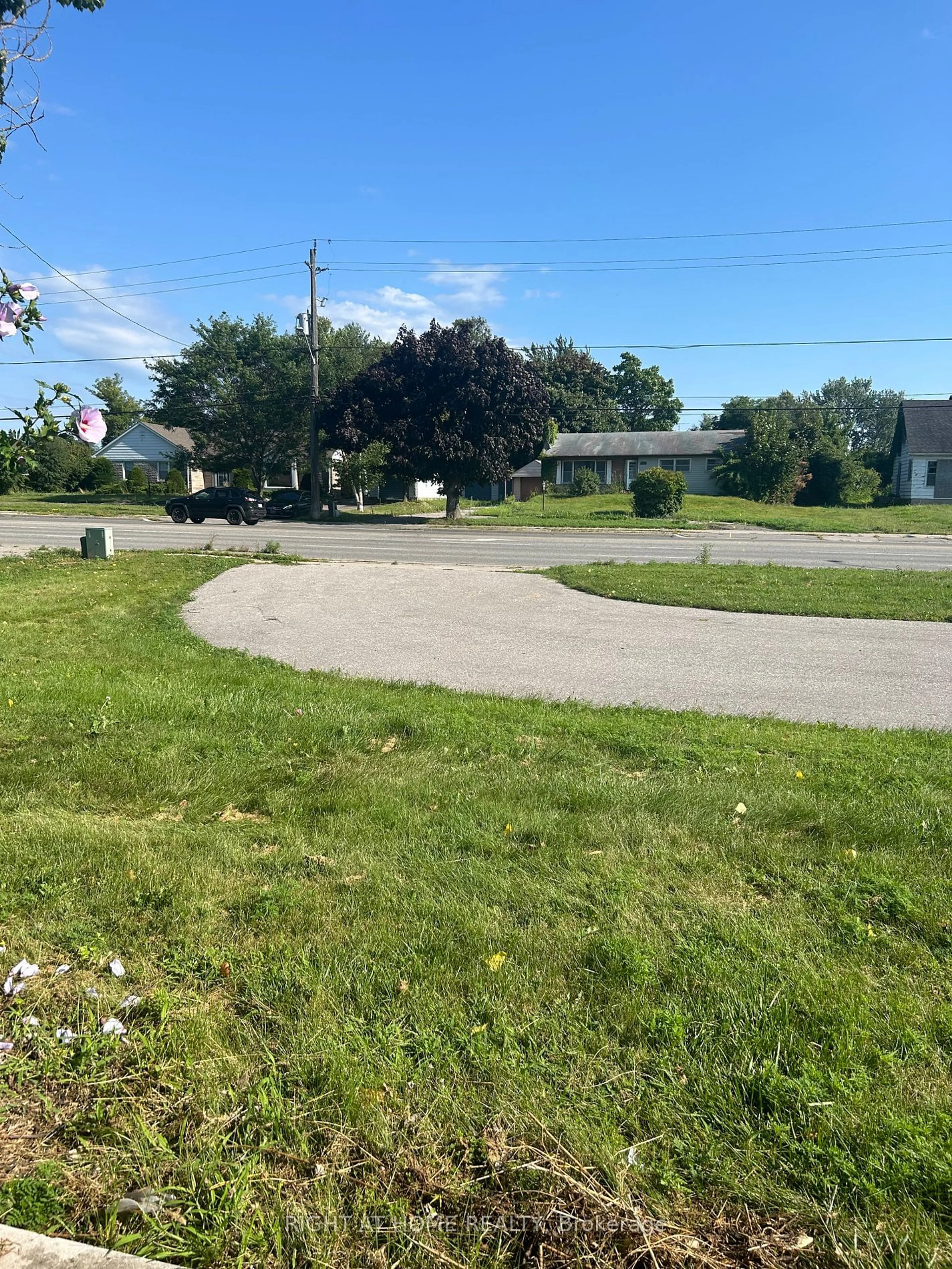 Frontside or backside of a home, the street view for 1592 Highway # 2 St, Clarington Ontario L1E 2R7